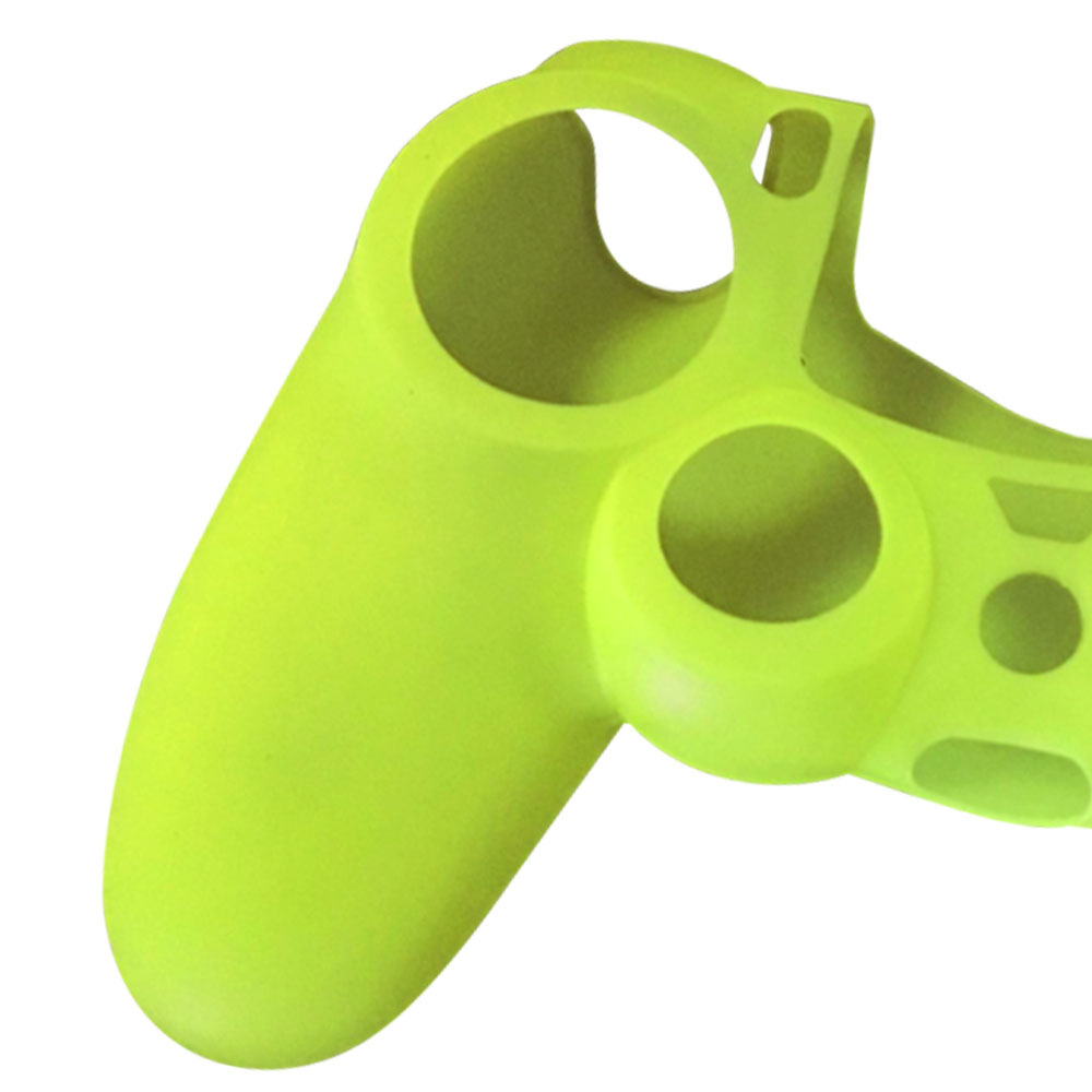 Eine hellgrüne Gamepad-Controller-Abdeckung. Sie hat Löcher für Knöpfe und eine bequeme Griffform.