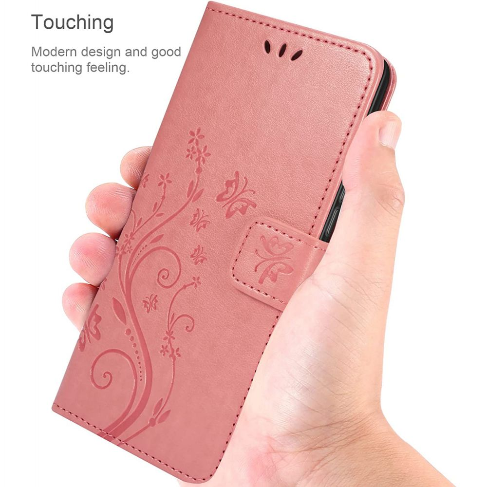Hand, die eine rosafarbene Handyhülle mit floralem Design hält und ihr modernes Design und das gute Berührungsgefühl hervorhebt.
