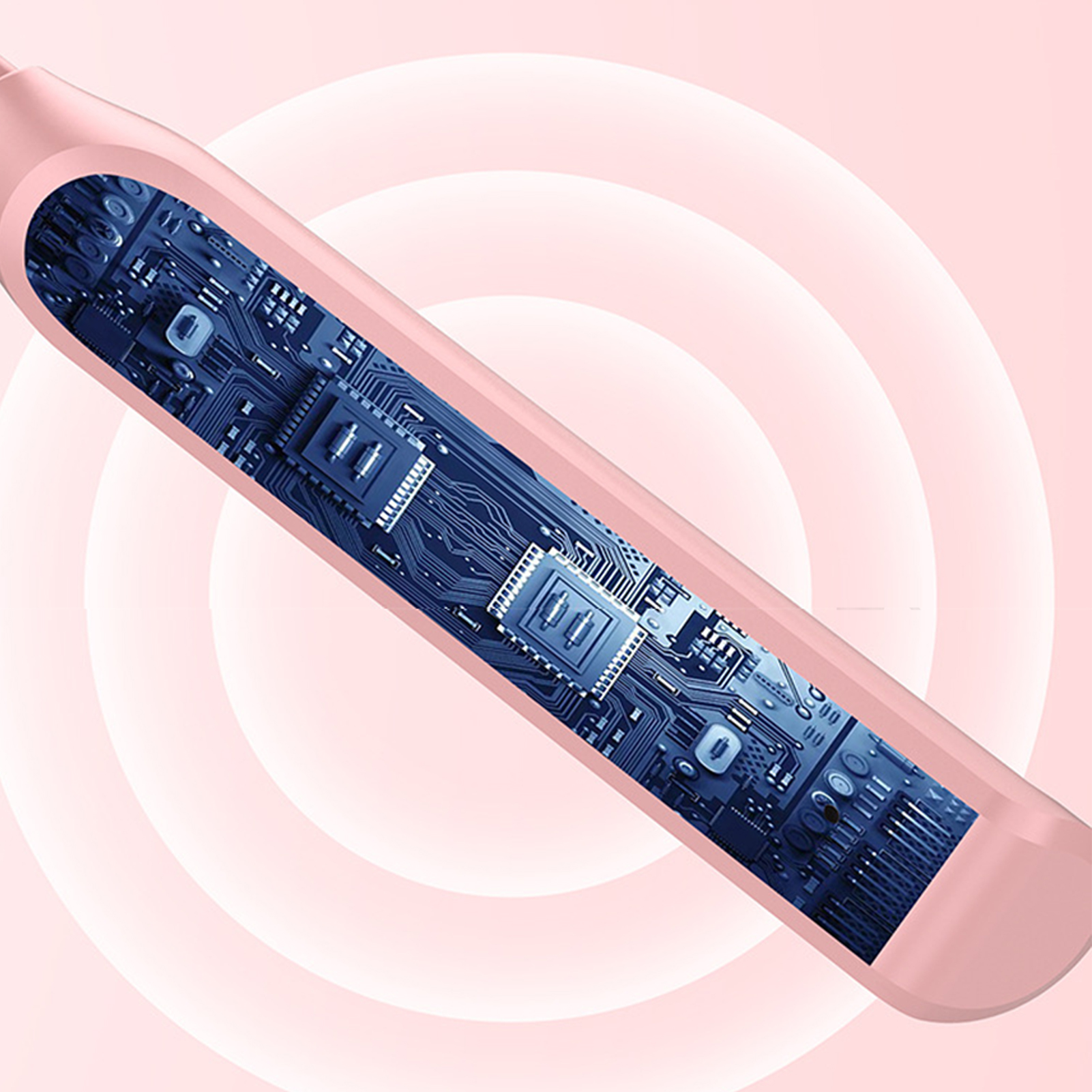 Nahaufnahme der internen Schaltkreise von rosa In-Ear-Kopfhörern vor einem rosa Hintergrund.