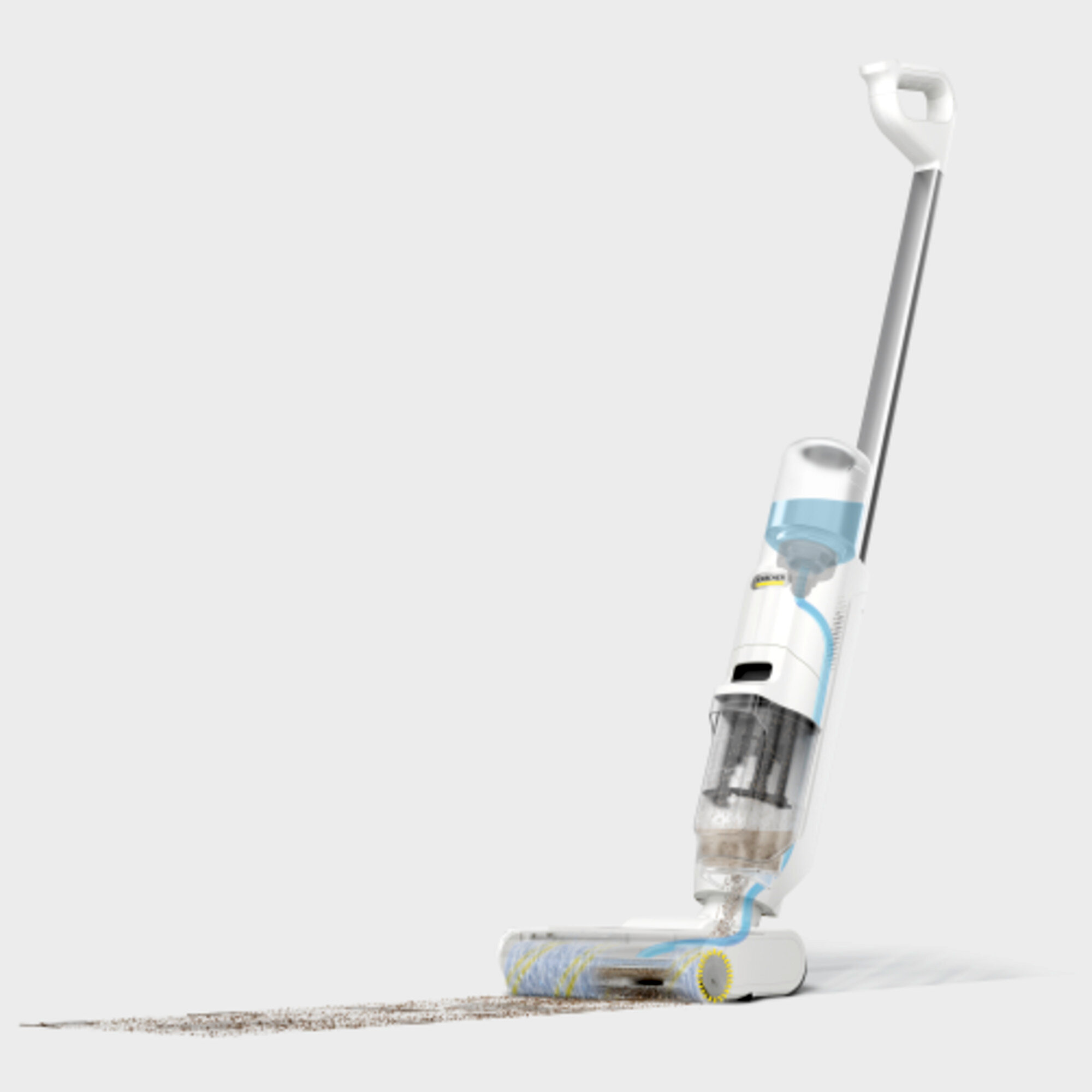 Biały i szary odkurzacz do podłóg jest pokazany na białym tle z brązowym brudem.