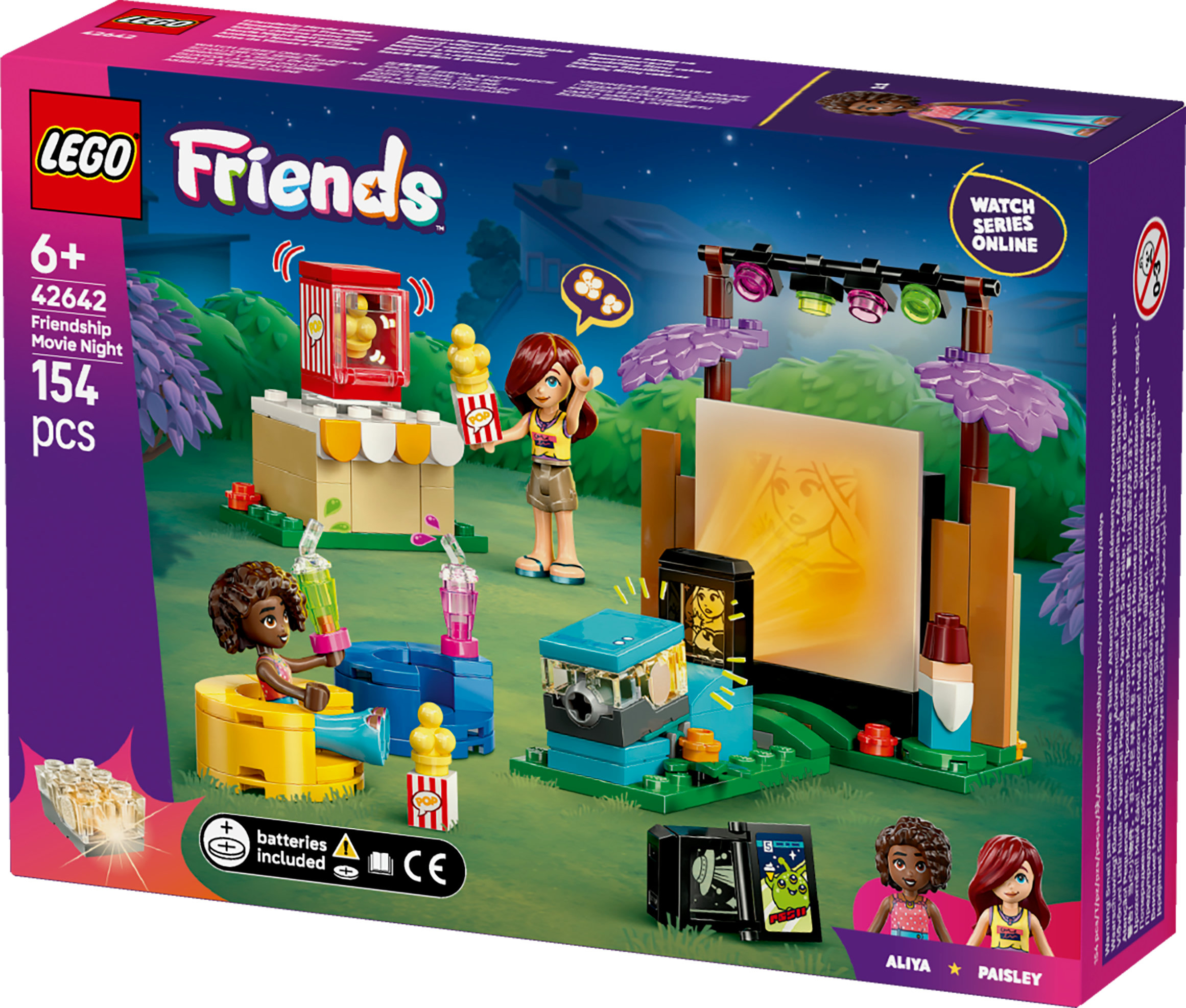 Pudełko Lego Friends z motywem wieczoru filmowego, stoiskiem z popcornem, projektorem i figurkami mini-lalek, fioletowe tło.