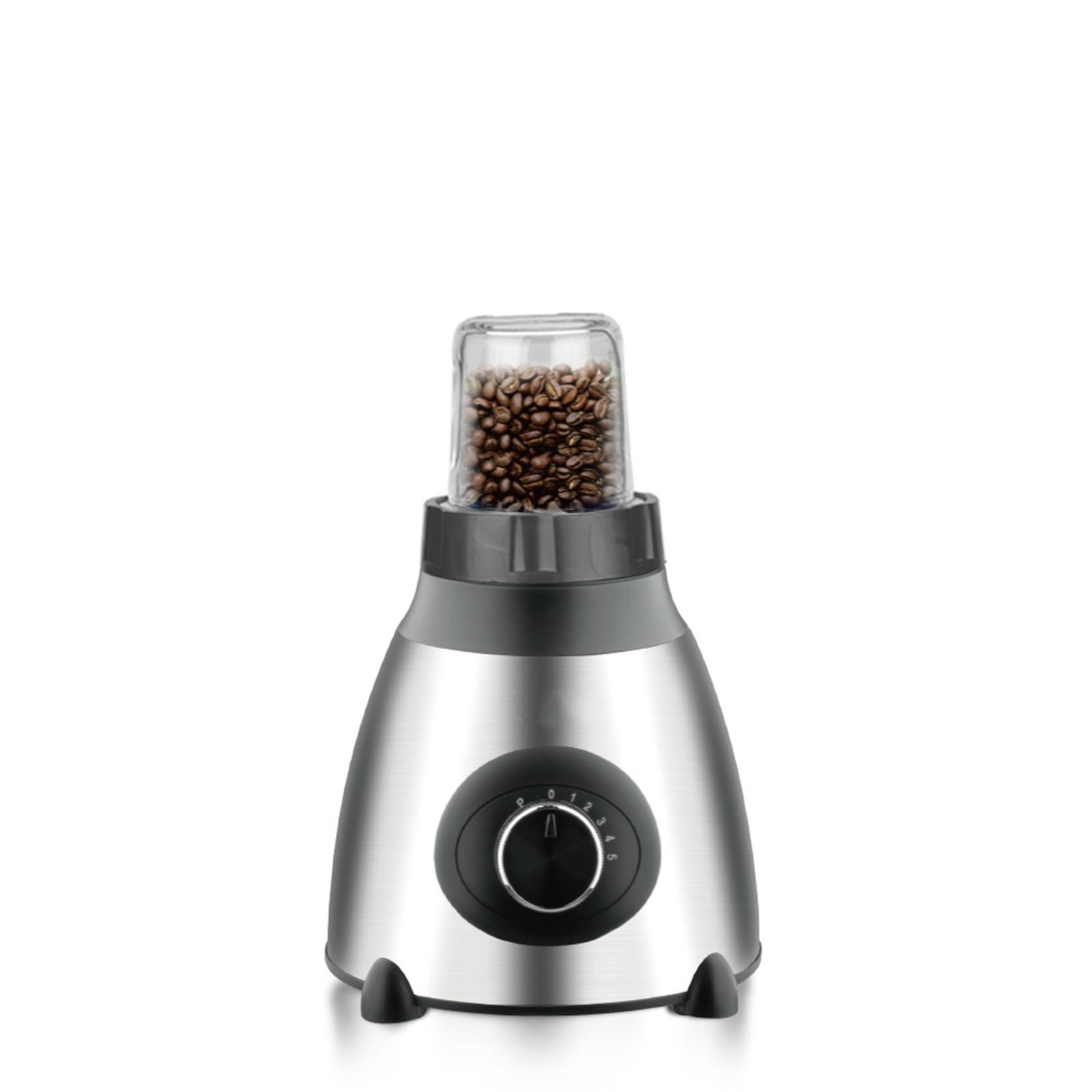 Ein silberner Mixer mit Kaffeebohnen im Becher. Der Drehregler ist auf '0' eingestellt.