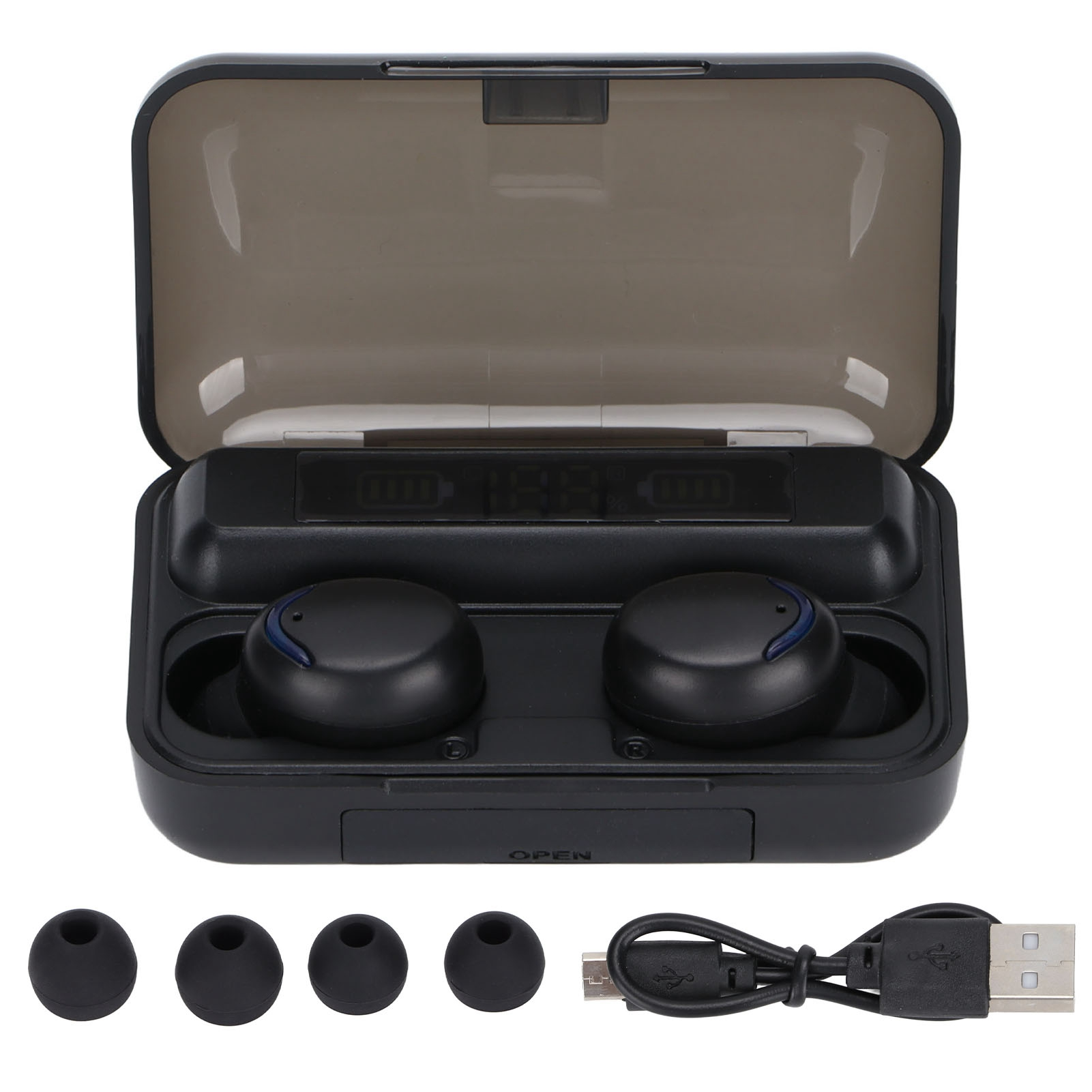 Schwarze kabellose Ohrhörer im Ladeetui mit zusätzlichen Aufsätzen und USB-Kabel, auf einer weißen Oberfläche platziert.