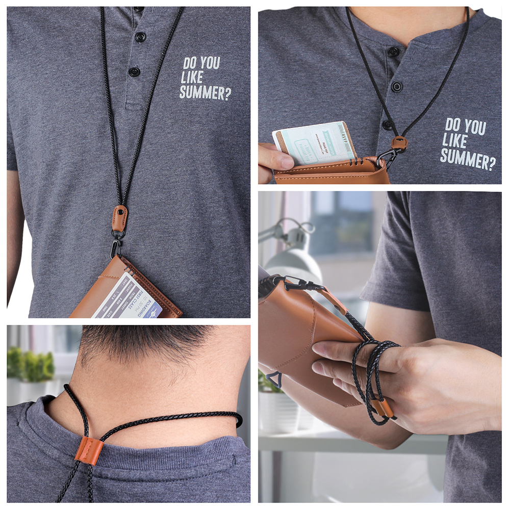 Eine Person, die ein Schlüsselband mit einem schwarzen geflochtenen Riemen, Lederakzent und ID-Halter trägt.