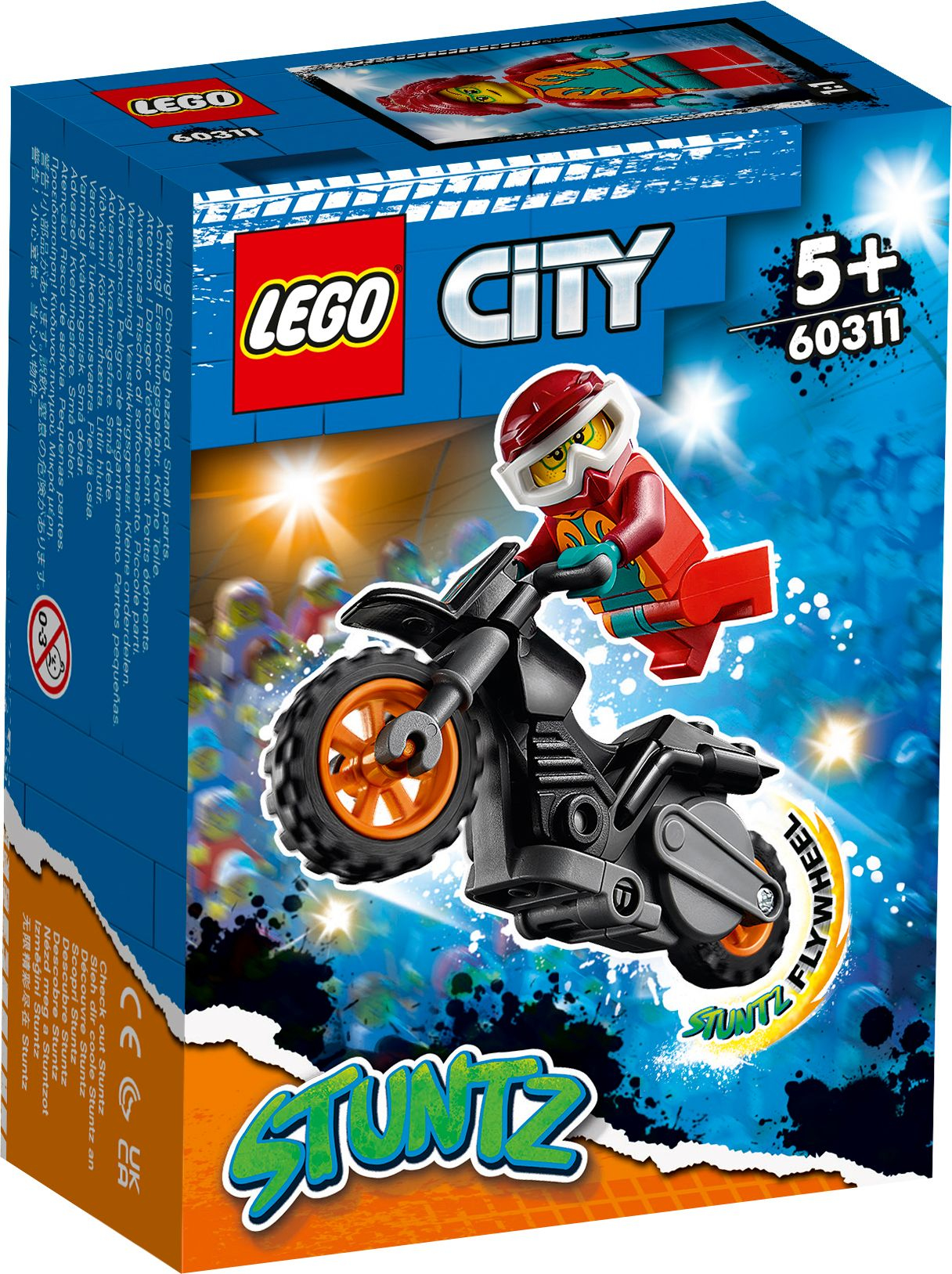 Ein LEGO City Stuntz Set mit einer Minifigur auf einem schwarz-orangen Schwungrad-Stuntbike.