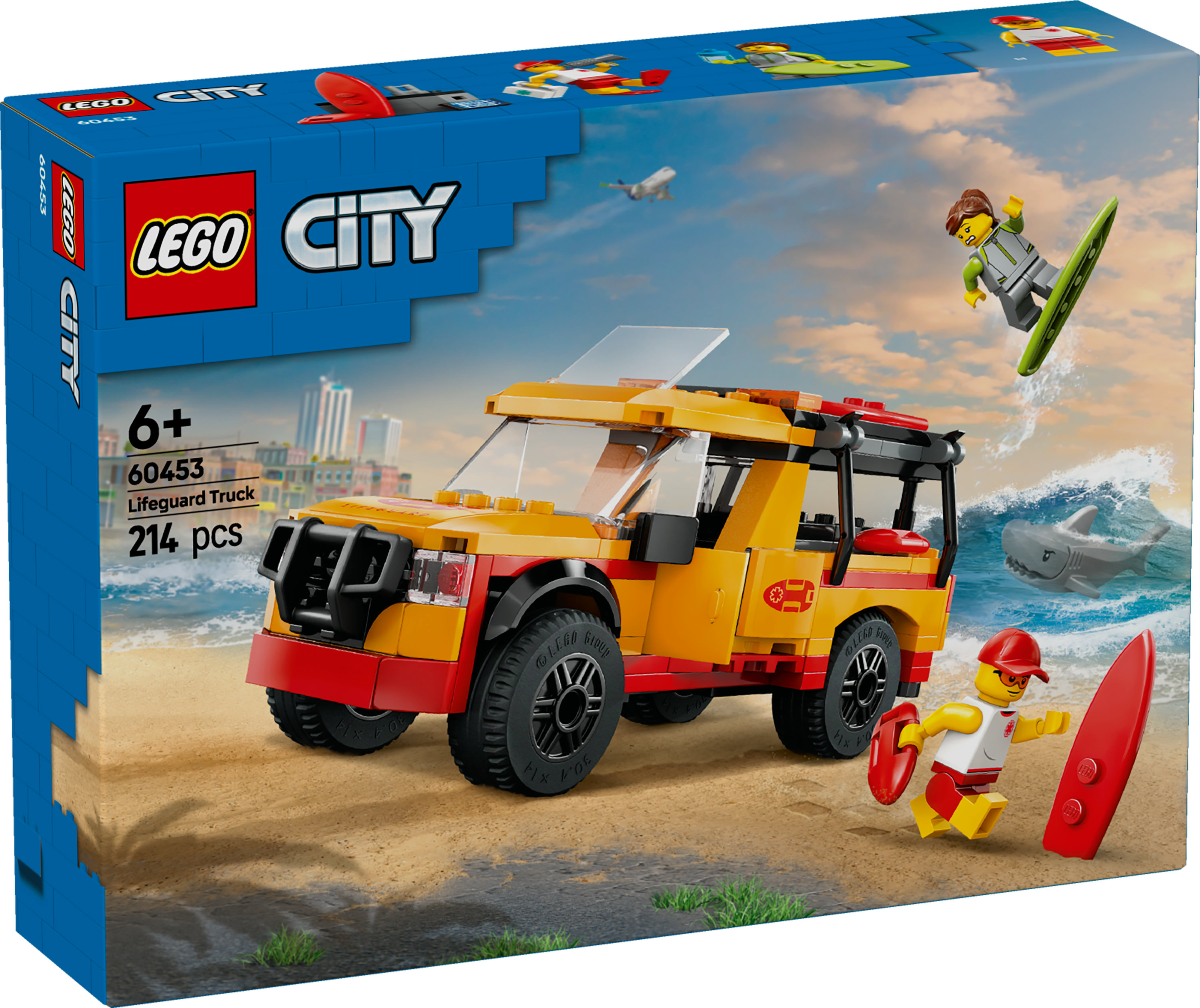 Camion de sauveteur Lego City sur une plage avec des figurines surfant et secourant. Ensemble avec camion, requin, planche.