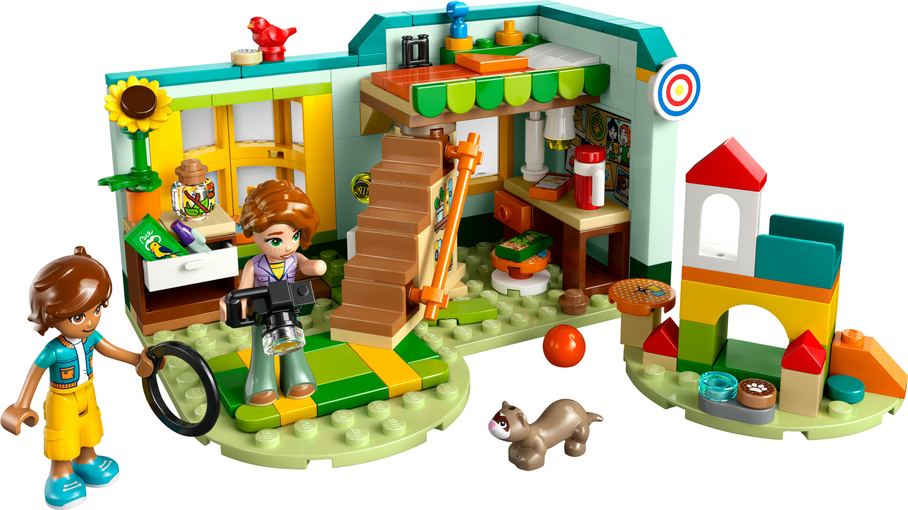 Zestaw Lego Friends: budynek modułowy ze studio fotograficznym, lalka z aparatem i inne akcesoria.