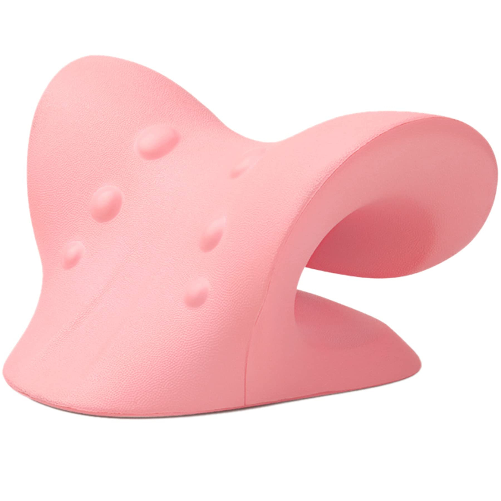 Ein rosa Nackenstützkissen von der Seite gesehen. Es ist mit Unebenheiten und einer zentralen, gebogenen Öffnung versehen.