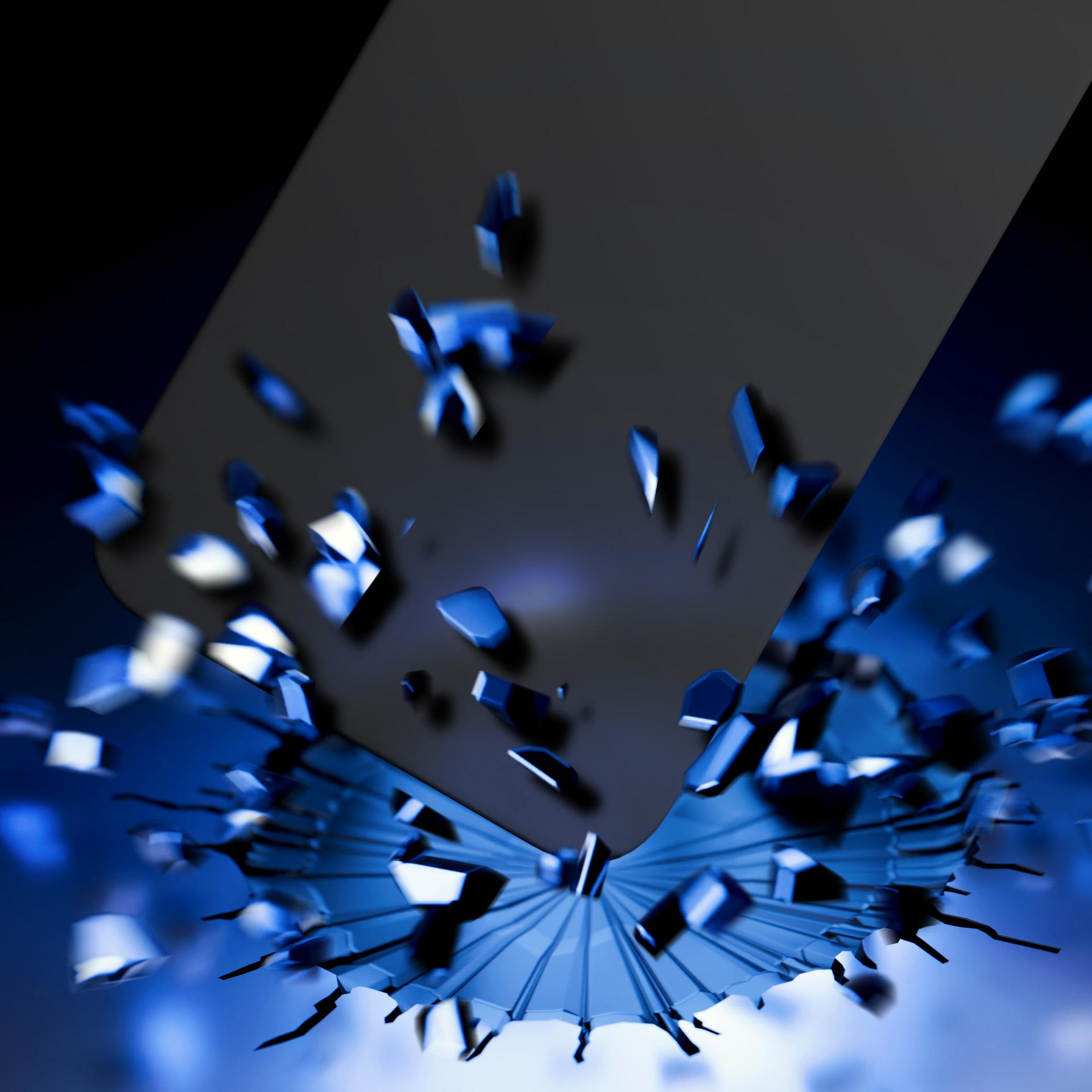 Czarna ochrona ekranu pęka. Niebieskie odłamki na ciemnym tle.