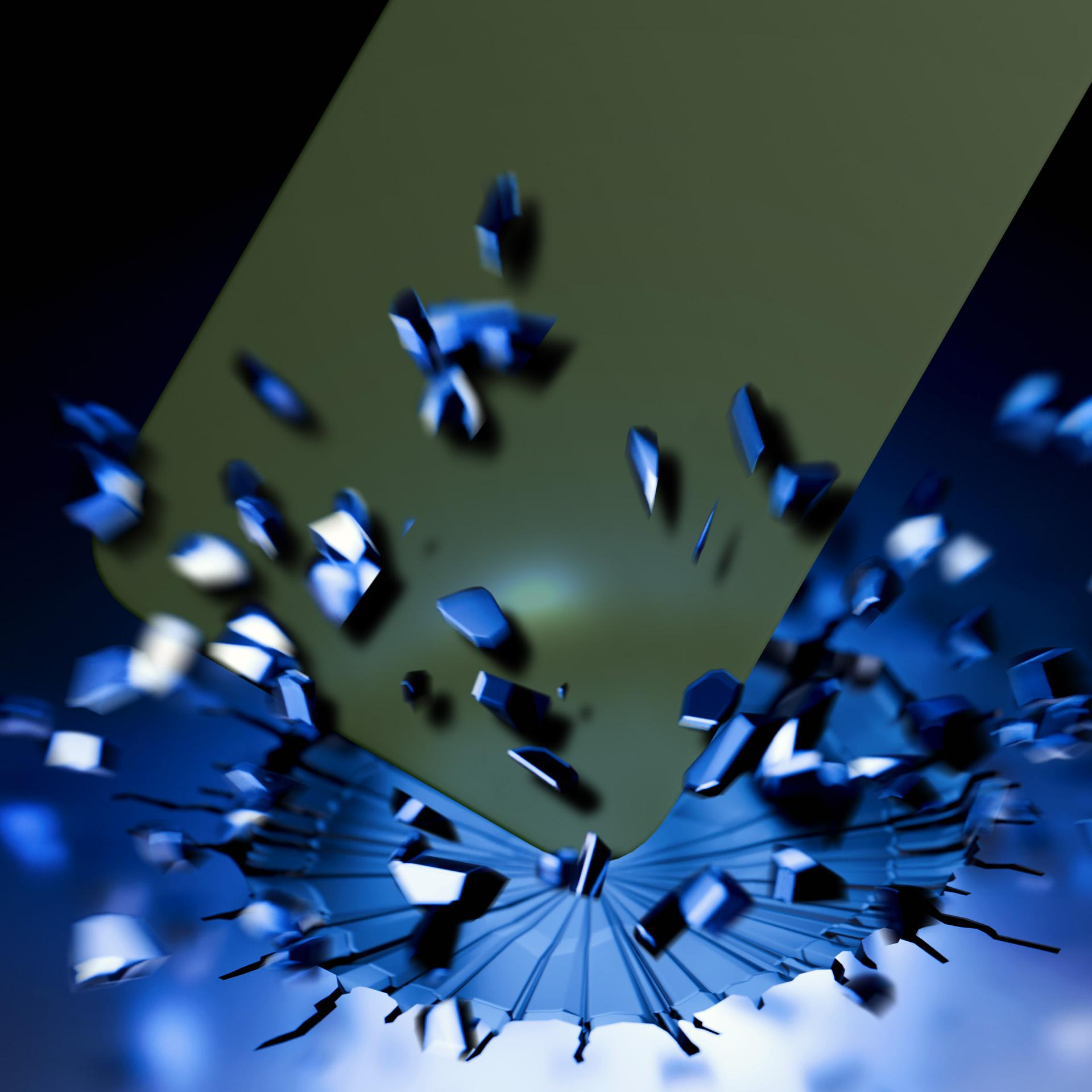 Etui na telefon pękające na kawałki, z niebieskimi odłamkami i zielonym tłem.