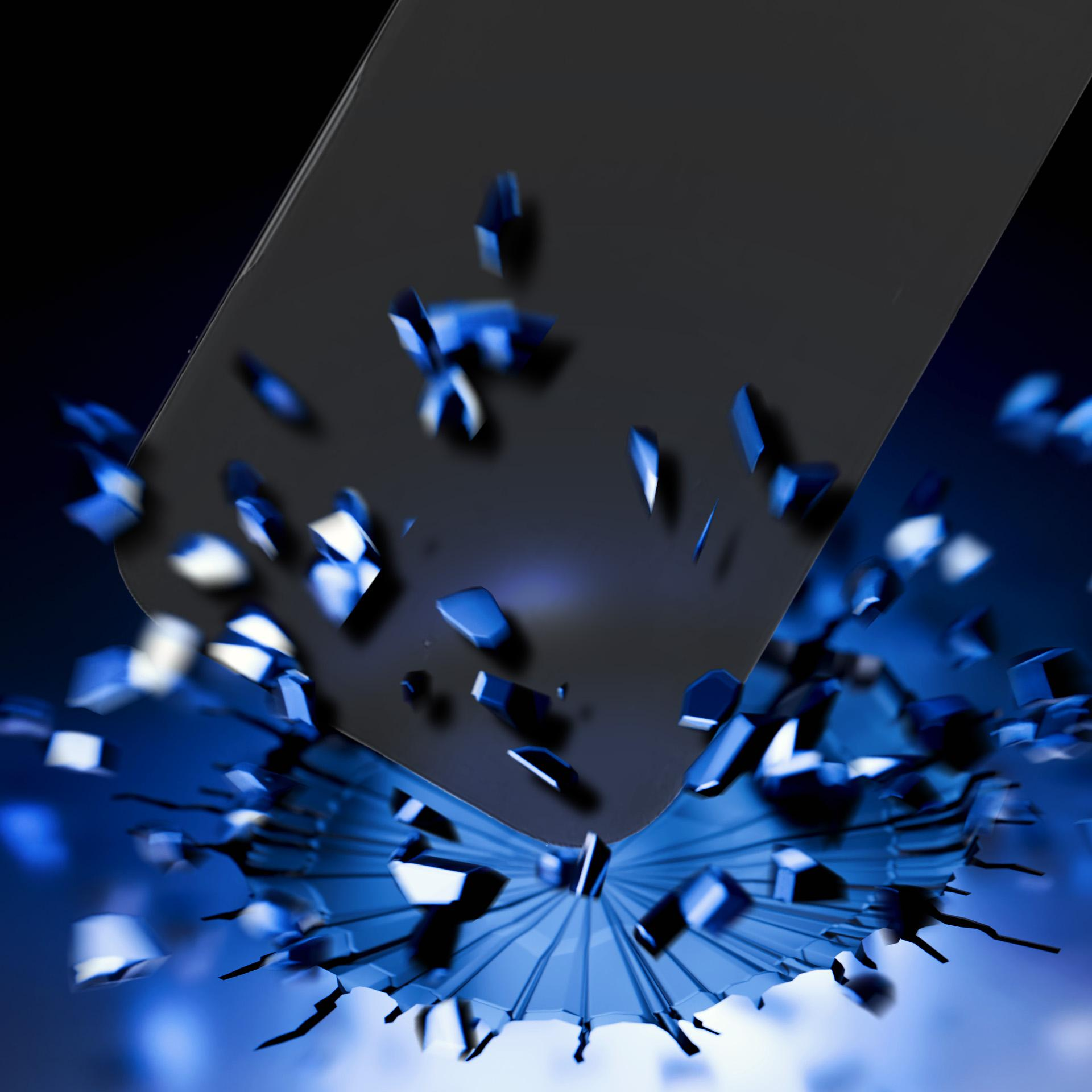 Ochraniacz ekranu telefonu zaraz uderzy w powierzchnię. Są niebieskie odłamki.