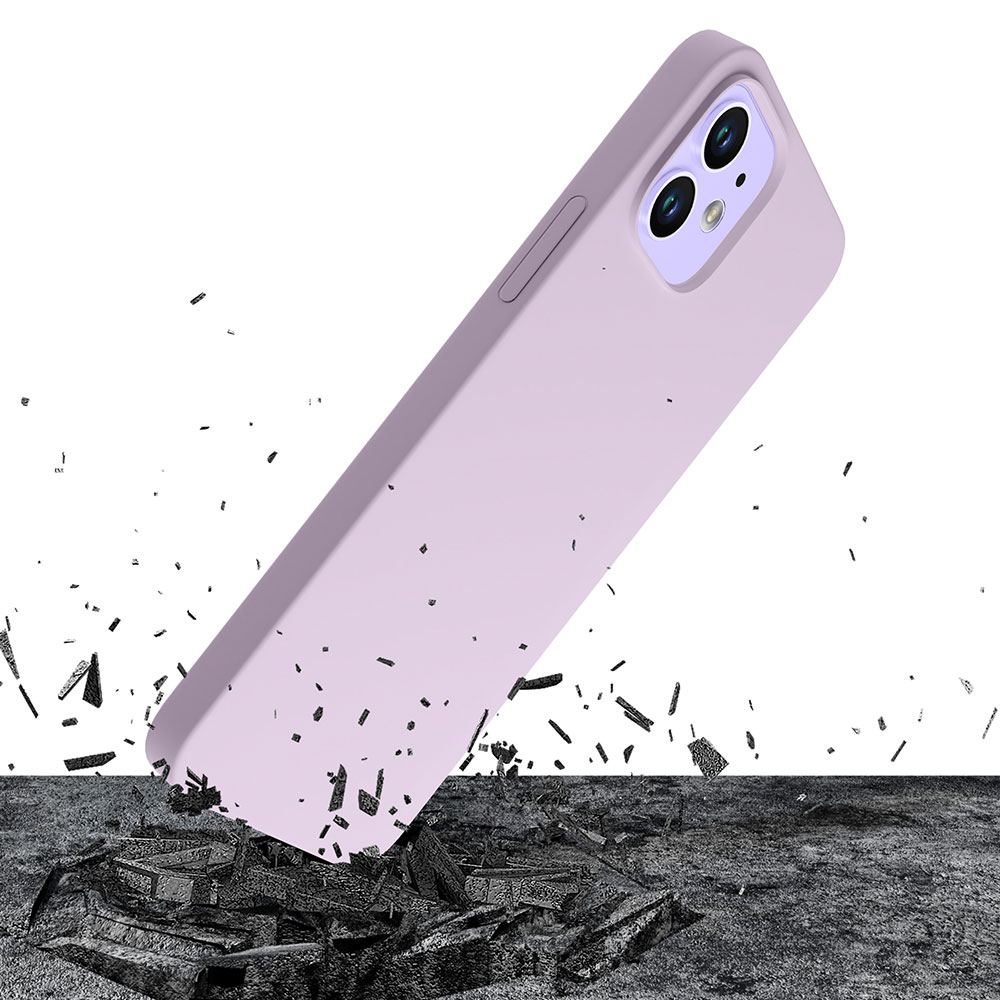Telefon w lawendowym etui spadający na kamienną powierzchnię. Etui jest ochronne.