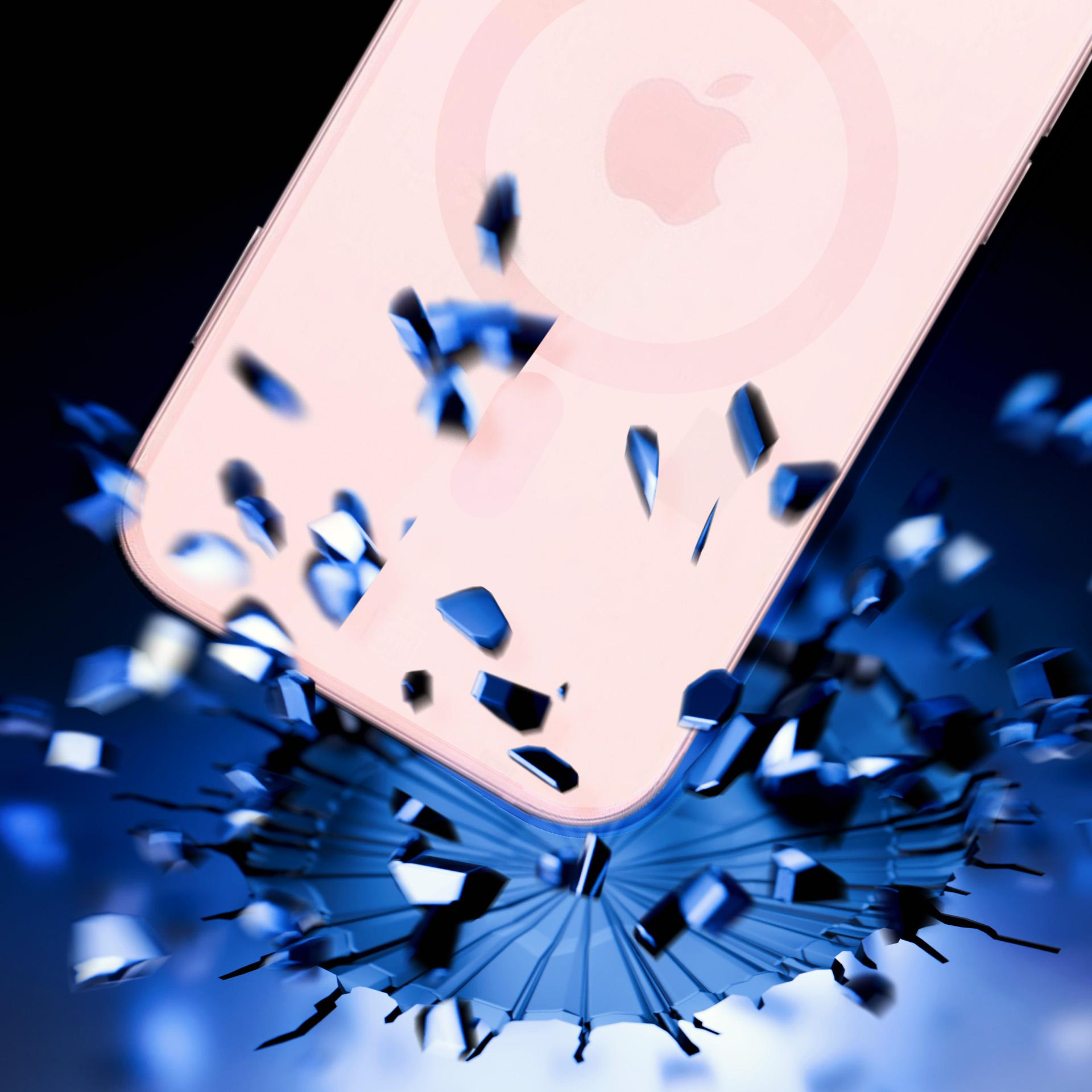 Różowy iPhone jest pokazany podczas upadku i rozbijania się o ziemię.