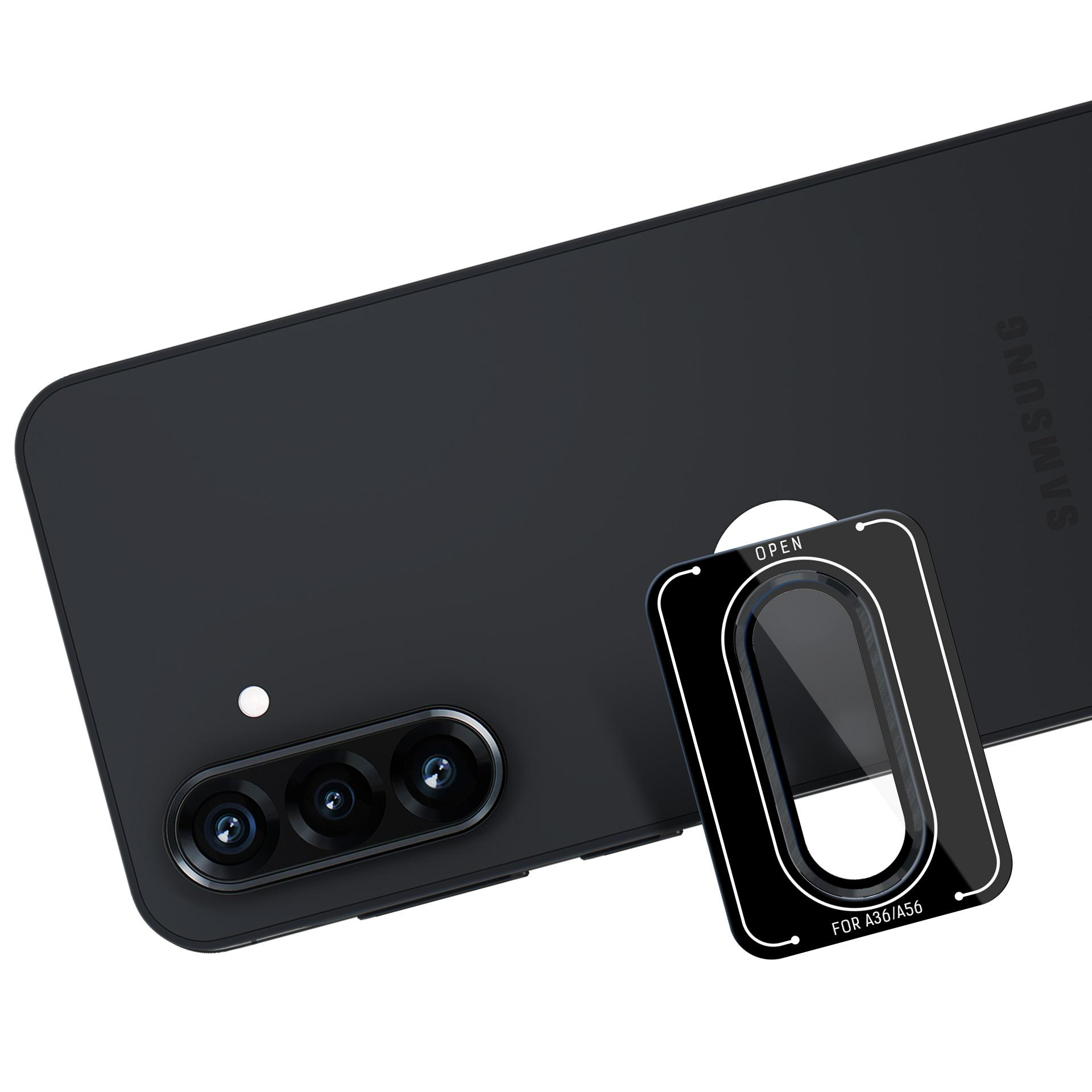 Czarny telefon z nakładaną osłoną obiektywu, z widocznym słowem 'OPEN'.