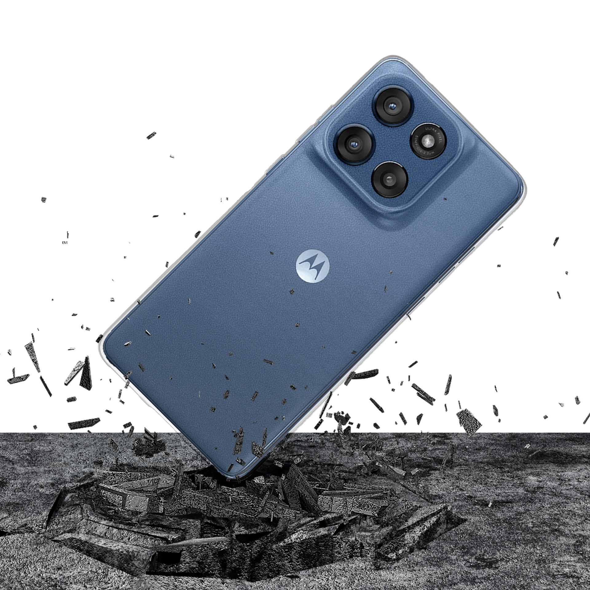 Un telefono Motorola blu cade, con pezzi di terra sparsi intorno ad esso.