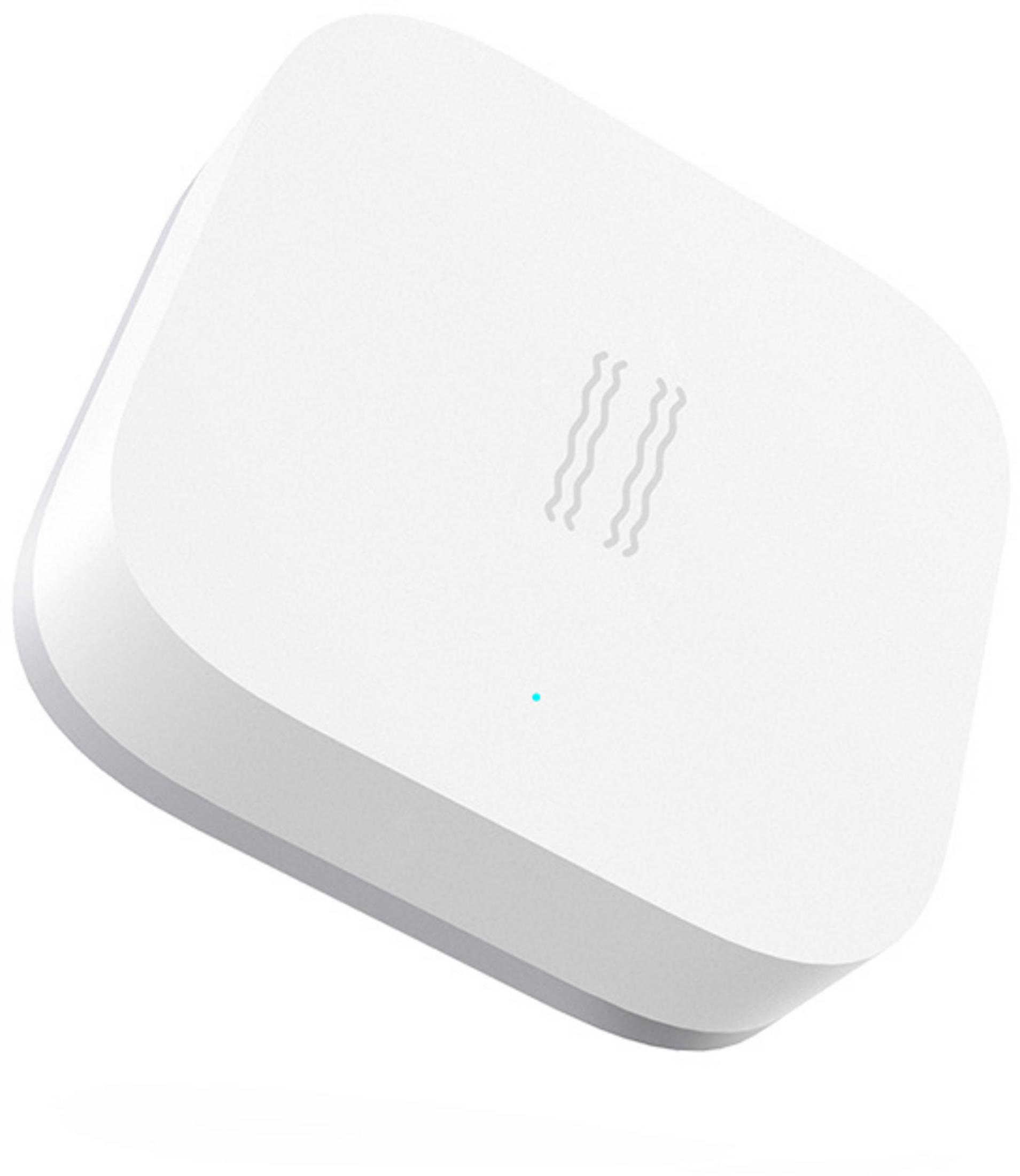Ein weißes, quadratisches Smart-Home-Gerät mit abgerundeten Ecken und einem kleinen blauen Licht an der Vorderseite.