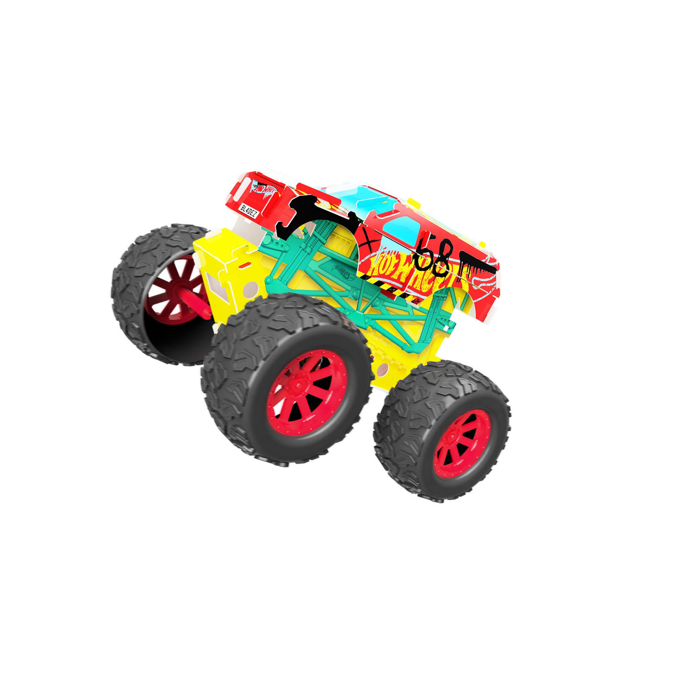 Ein Spielzeug-Monstertruck mit roten Rädern und farbenfrohem Gehäuse, vor weißem Hintergrund.