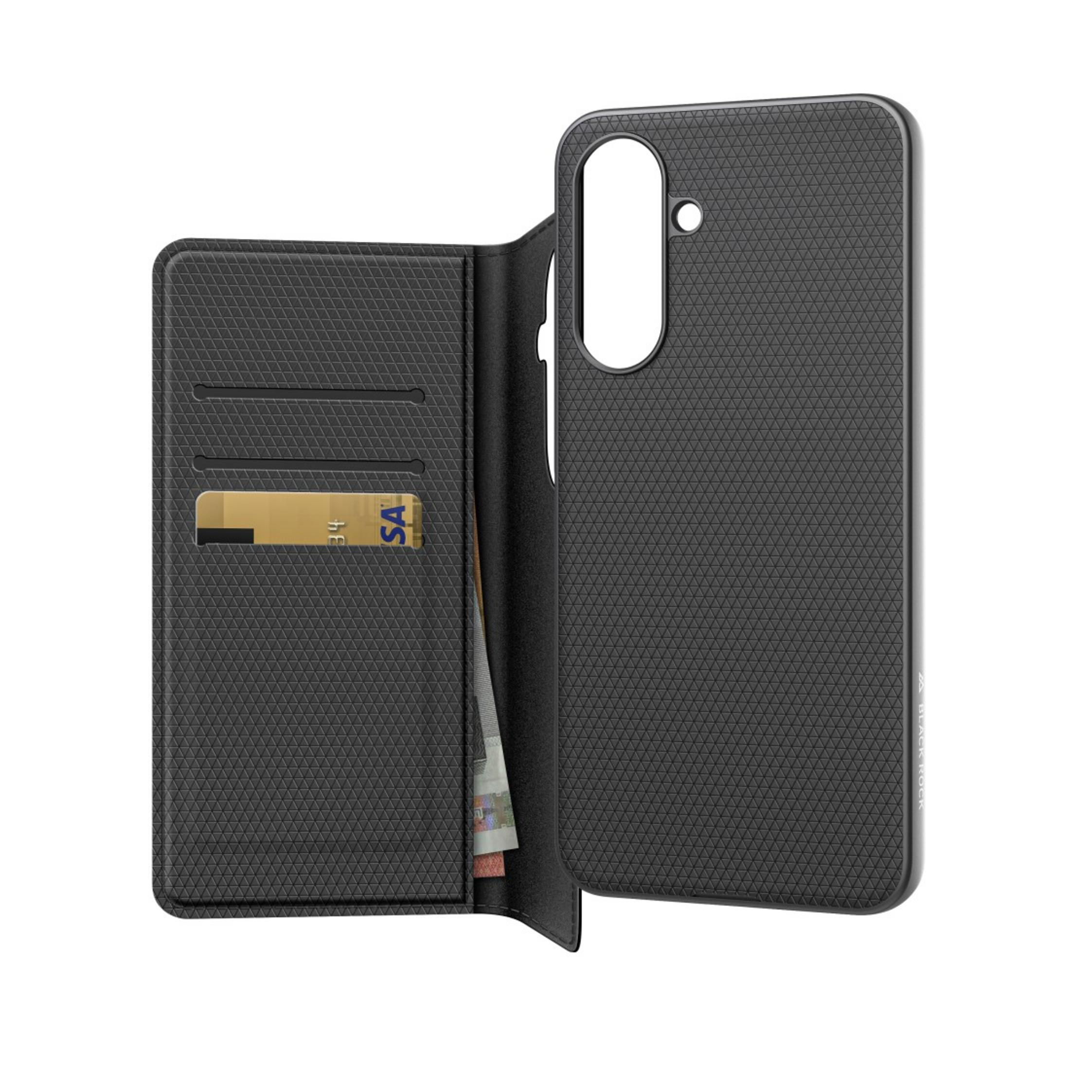 Un étui portefeuille noir avec de l'argent et une carte de crédit, attaché à un étui de téléphone noir.