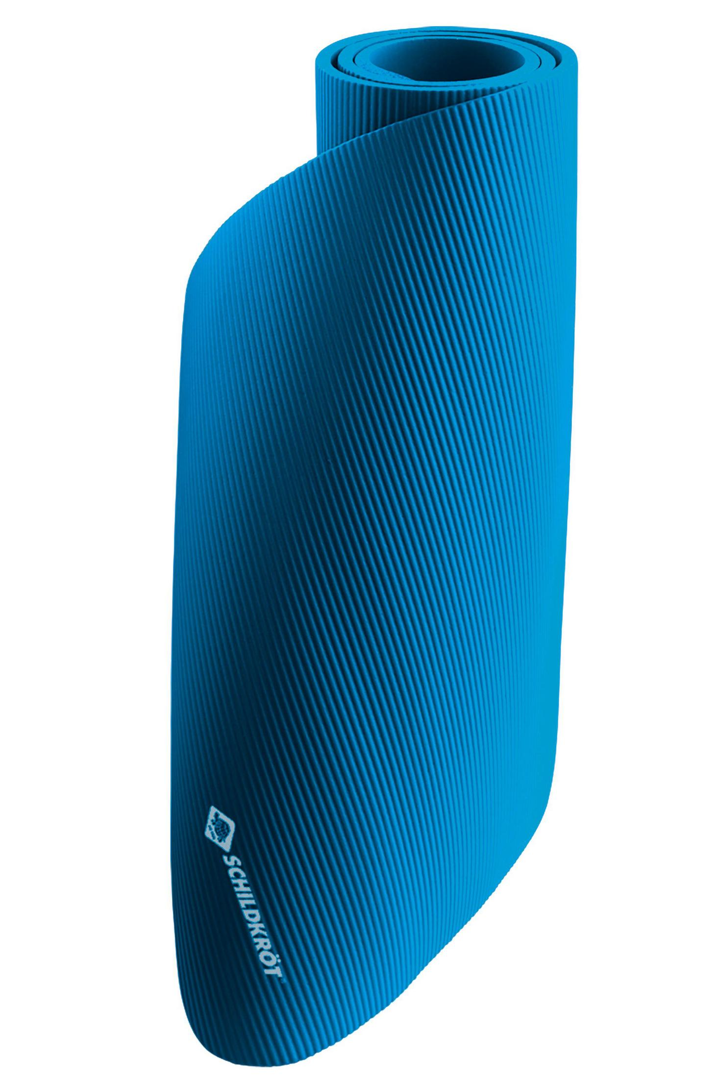 Un tappetino da esercizi arrotolato di colore blu brillante con una texture a coste e un logo.