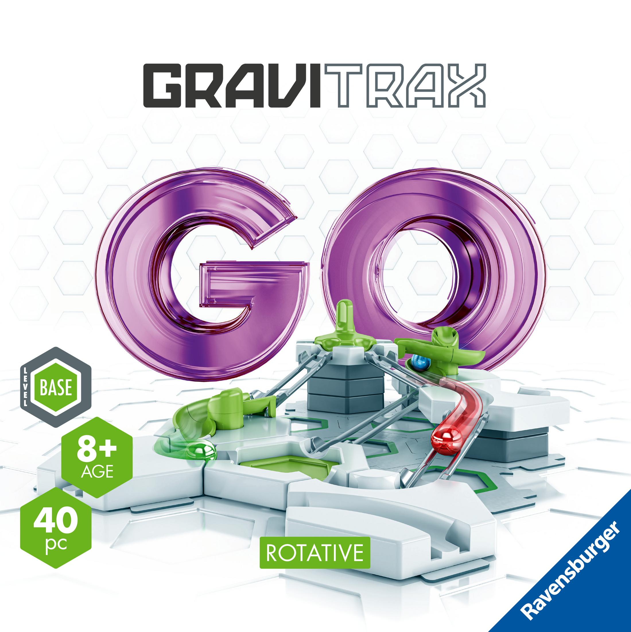 Ein Gravitrax Go-Set mit durchscheinenden violetten Bahnen und grünen Akzenten auf einem weißen Sockel.