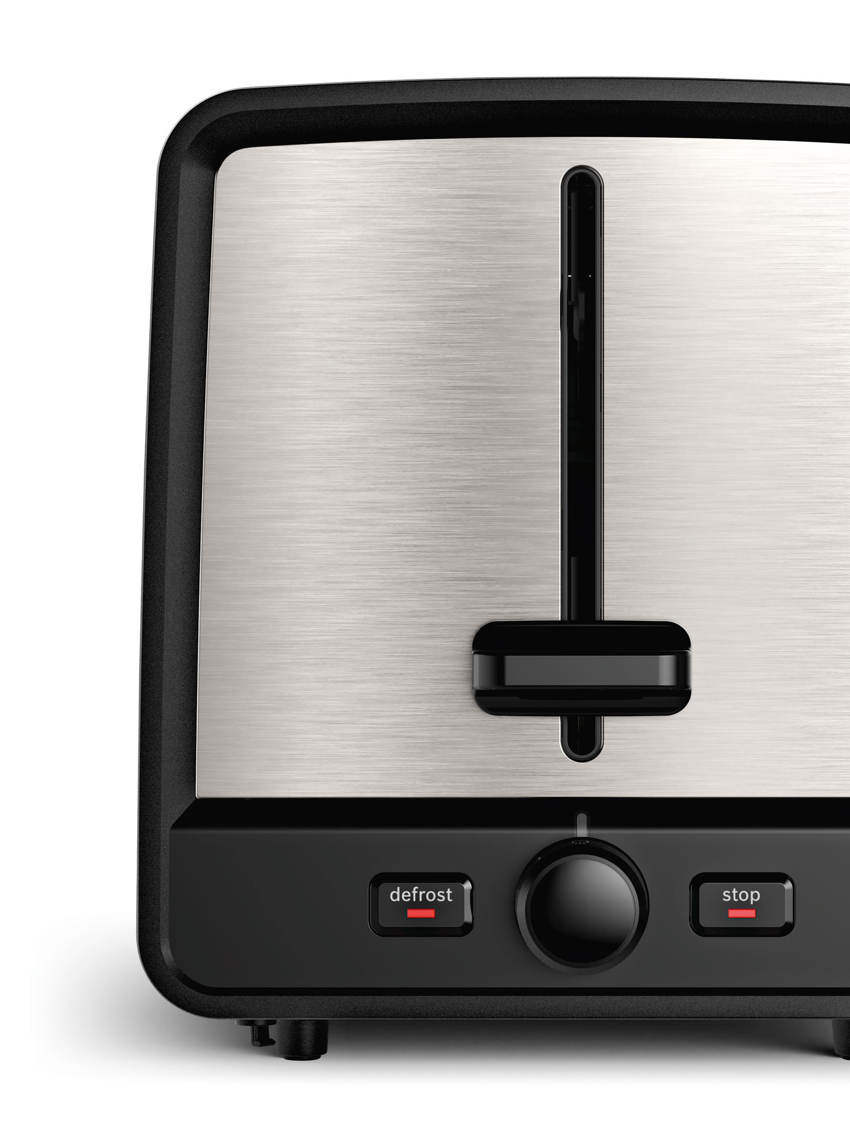 Close-up of a toaster. It has a dial and buttons labeled 'defrost' and 'stop'.