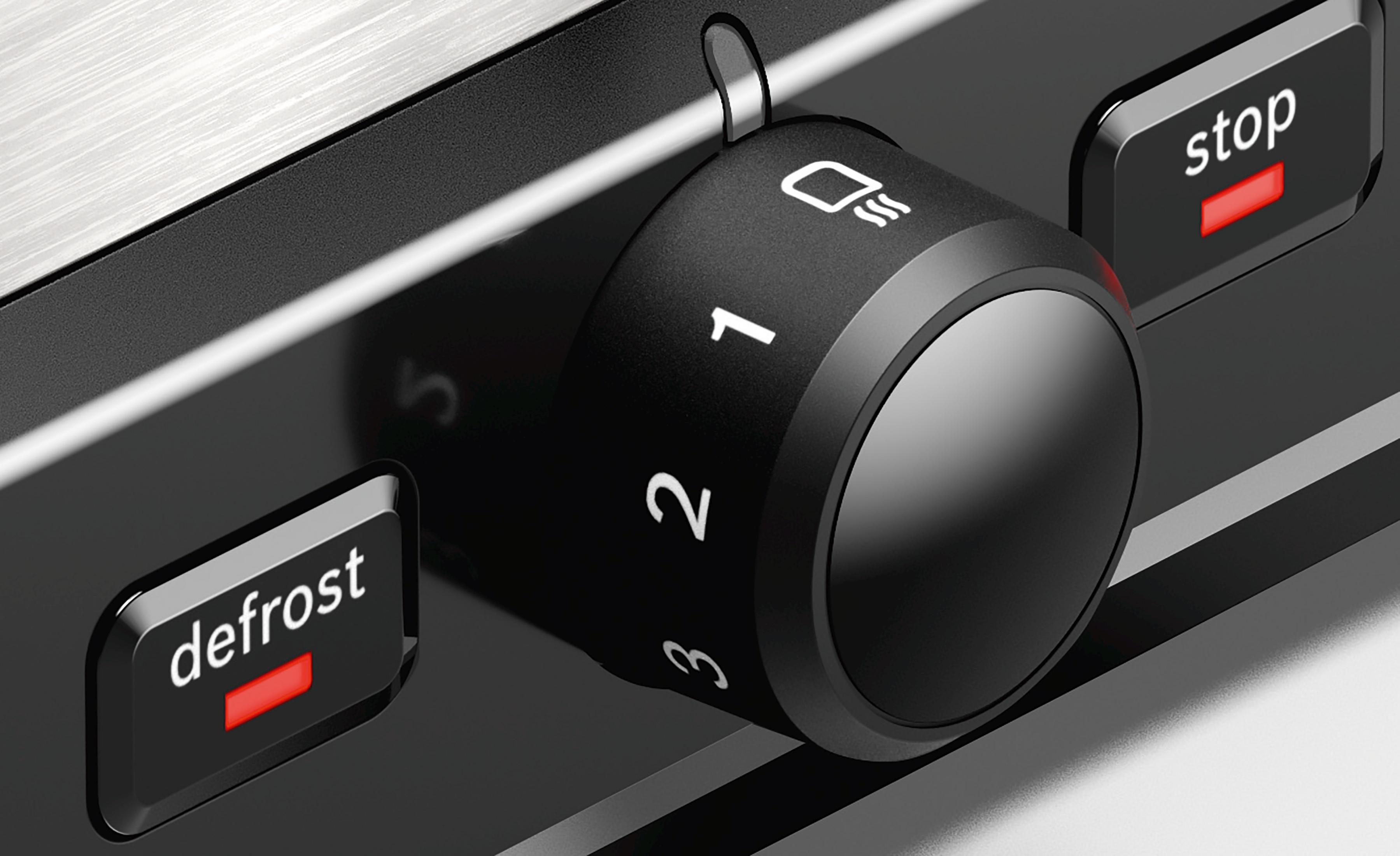 Close up of the toaster dial. It has numbers, a toaster symbol and 'defrost' and 'stop' buttons.