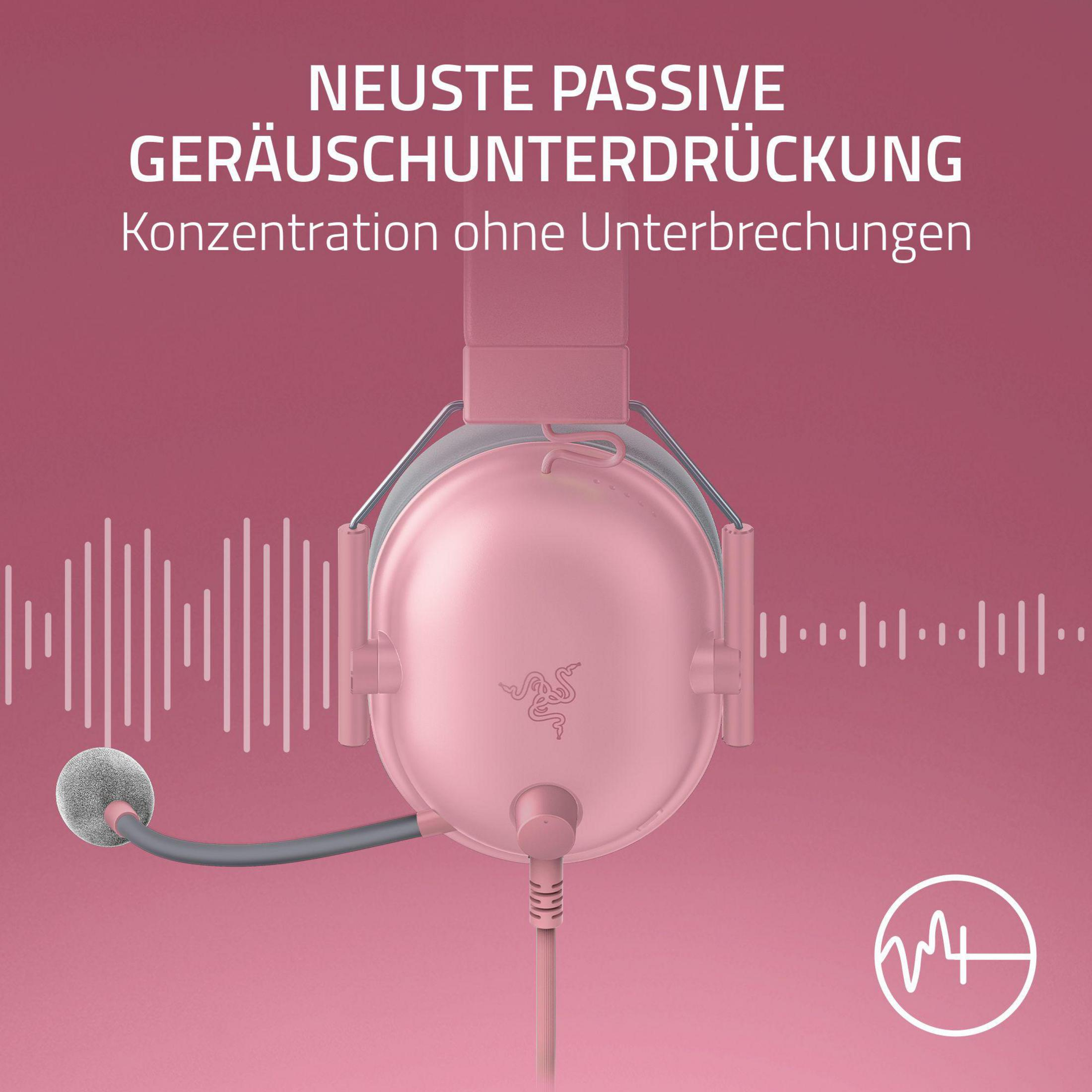 Immagine con cuffie Razer su sfondo rosa, che evidenzia le caratteristiche di soppressione del rumore.