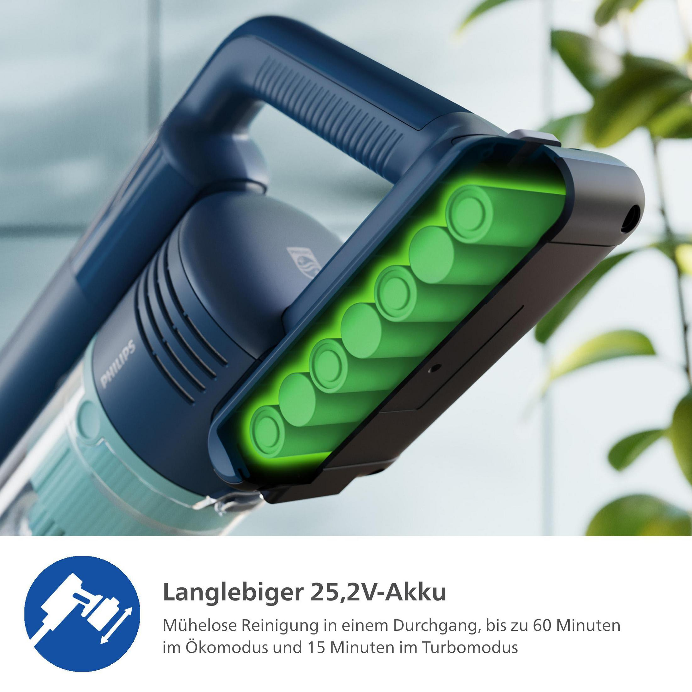 L'aspirapolvere con una batteria. La batteria è verde. L'aspirapolvere è blu.