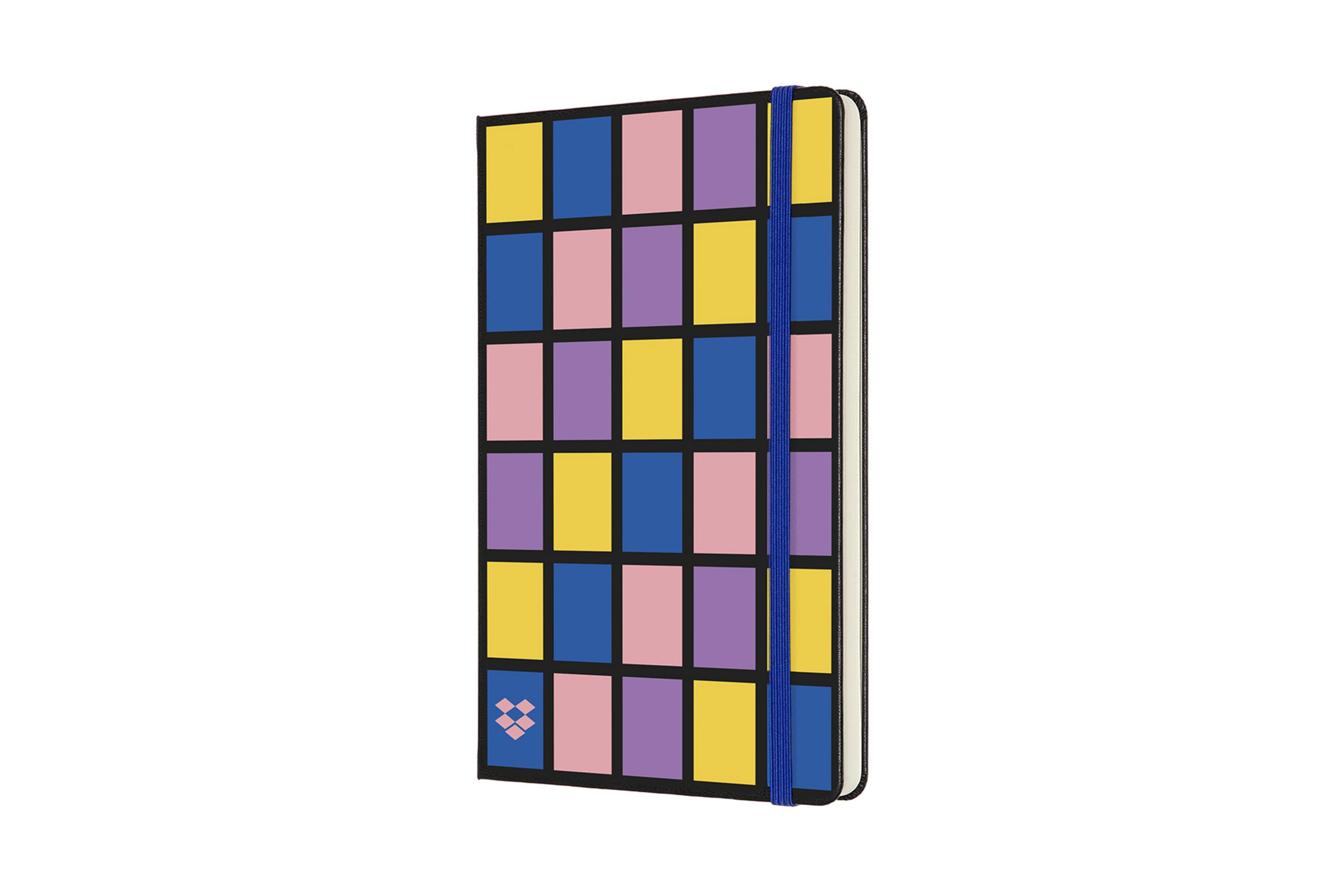 Moleskine Notizbuch, farbenfrohes geometrisches Muster auf dem Einband, blaues Gummiband.