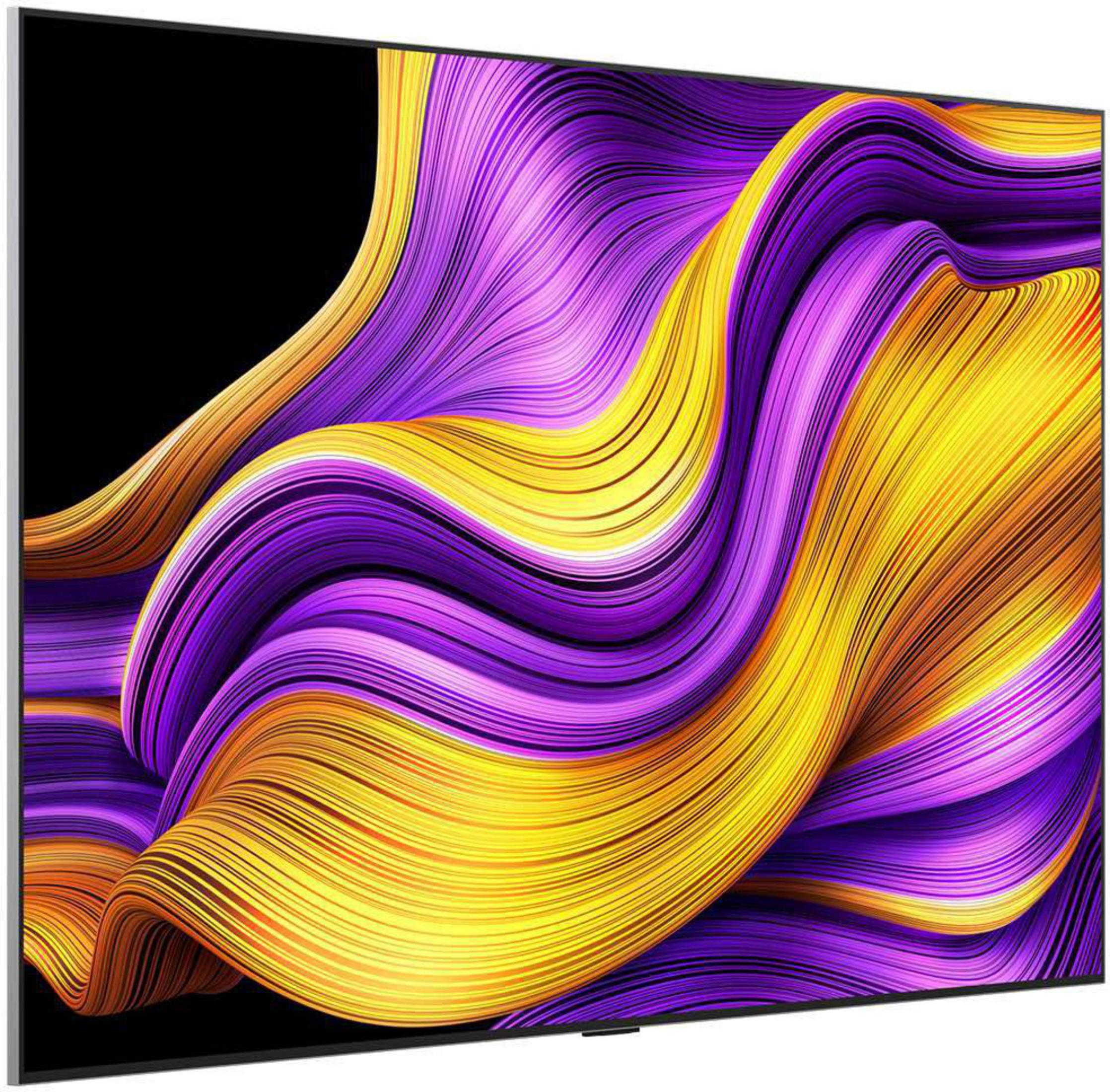 Ein Fernsehbildschirm mit einem wellenförmigen Design in Lila, Gelb und Gold. Der Hintergrund ist schwarz.