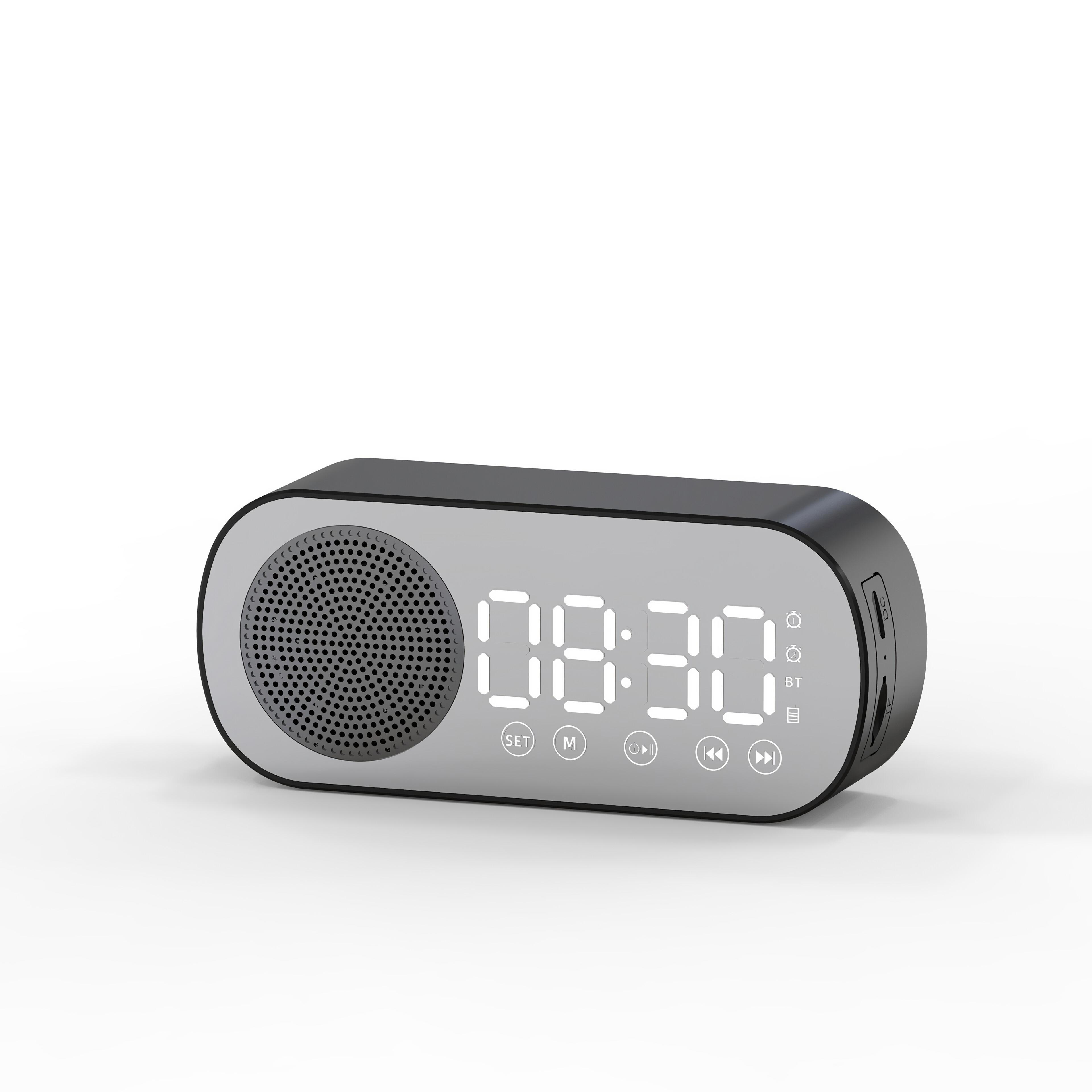 Schwarzer Wecker mit Digitalanzeige und Lautsprecher. Die Uhrzeit '08:30' wird angezeigt.