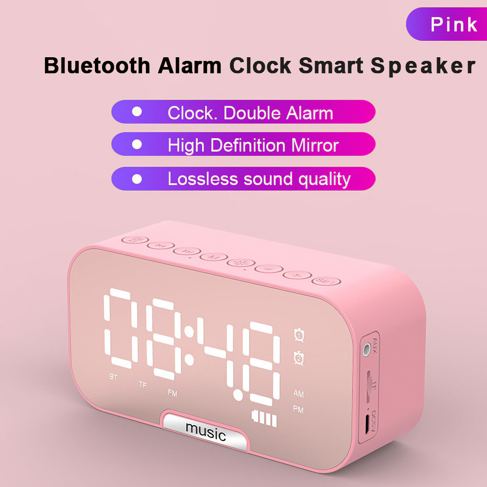 Rosa Bluetooth-Weckerlautsprecher mit Spiegelanzeige, die 08:48 und Funktionsanzeigen anzeigt.