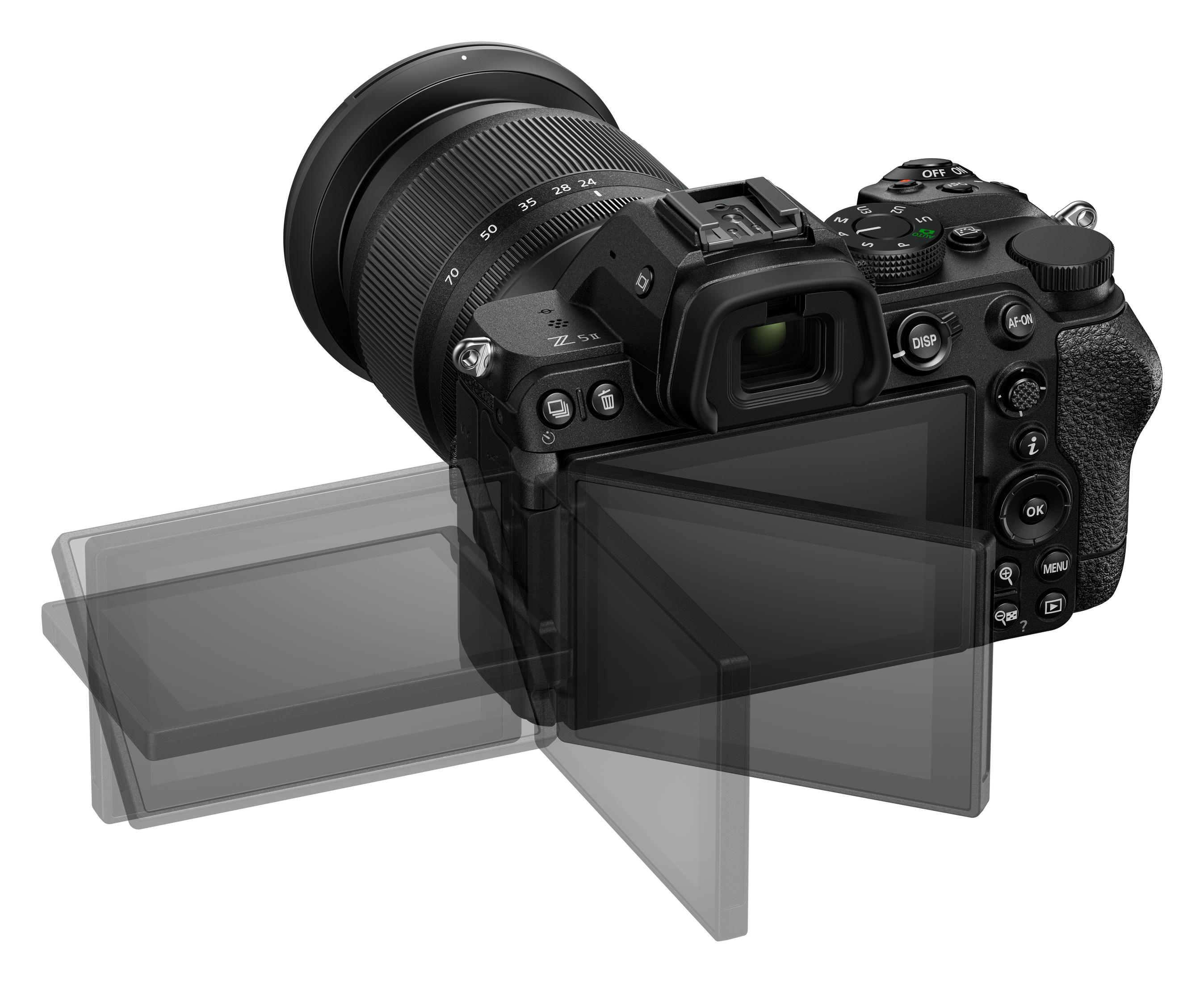 Cámara Nikon Z negra con pantalla abierta. La pantalla muestra una imagen. Cámara en ángulo.