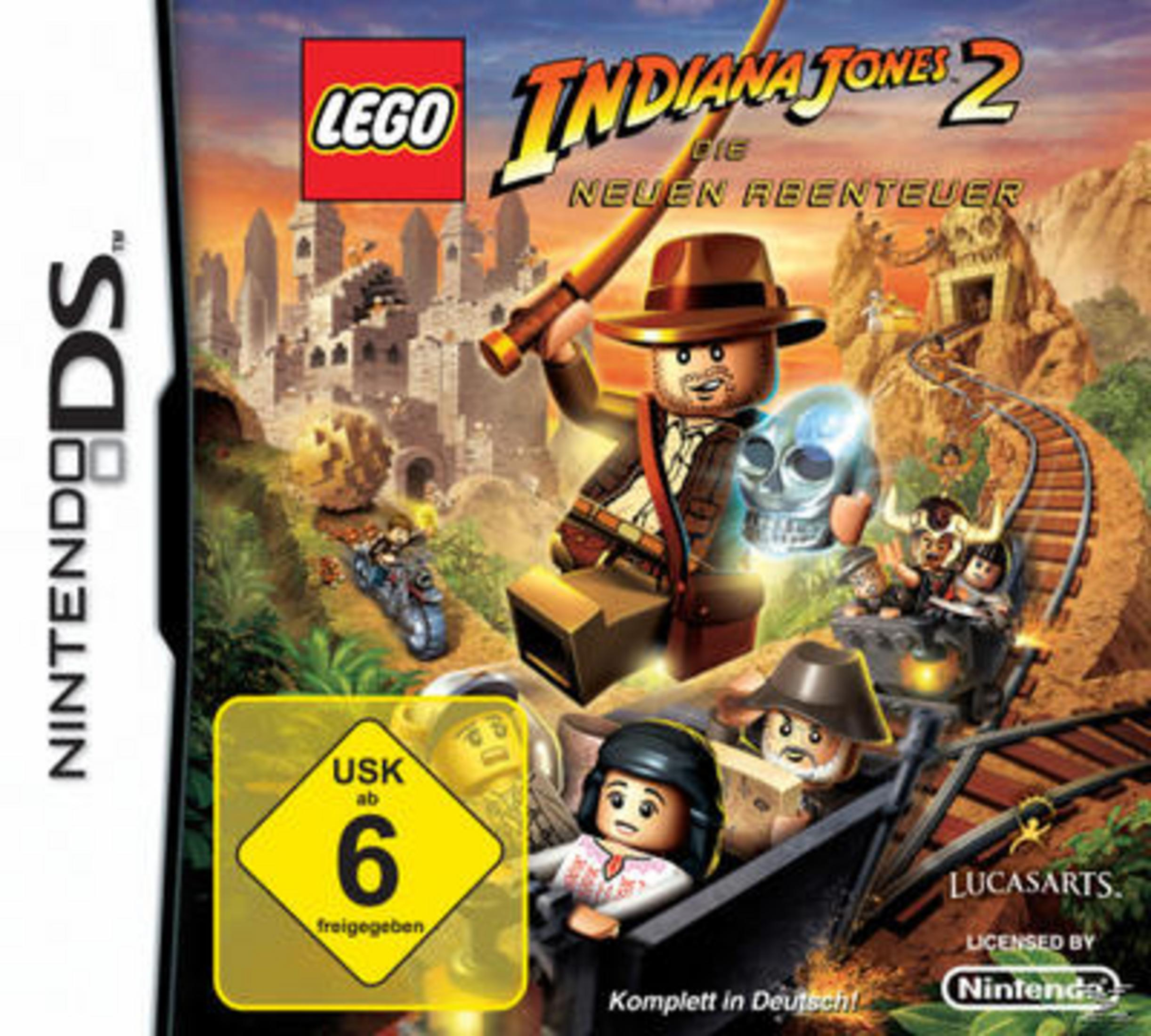 Das Cover des Spiels „LEGO Indiana Jones 2“ zeigt LEGO Indiana Jones, einen Schädel und eine Grubenszene.