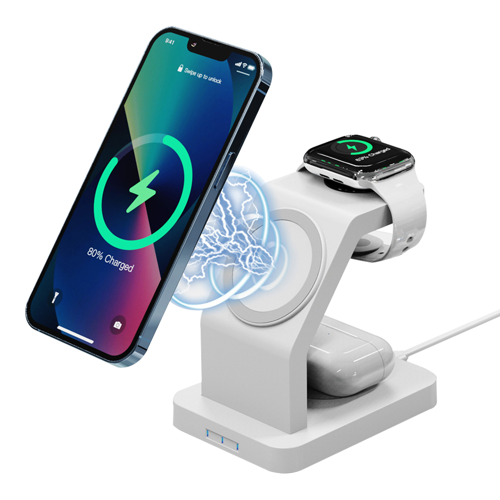 Eine weiße Ladestation mit Telefon, Uhr und Ohrhörern, die alle geladen werden.