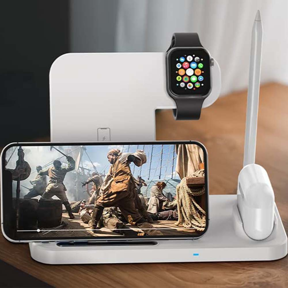 Eine Ladestation mit Telefon, Uhr, Stift und Ohrhörern.