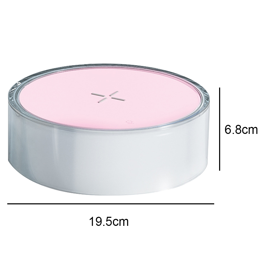 Ein rundes Gerät mit rosa Oberteil und silberner Basis. Abmessungen: 19,5 cm breit und 6,8 cm hoch.