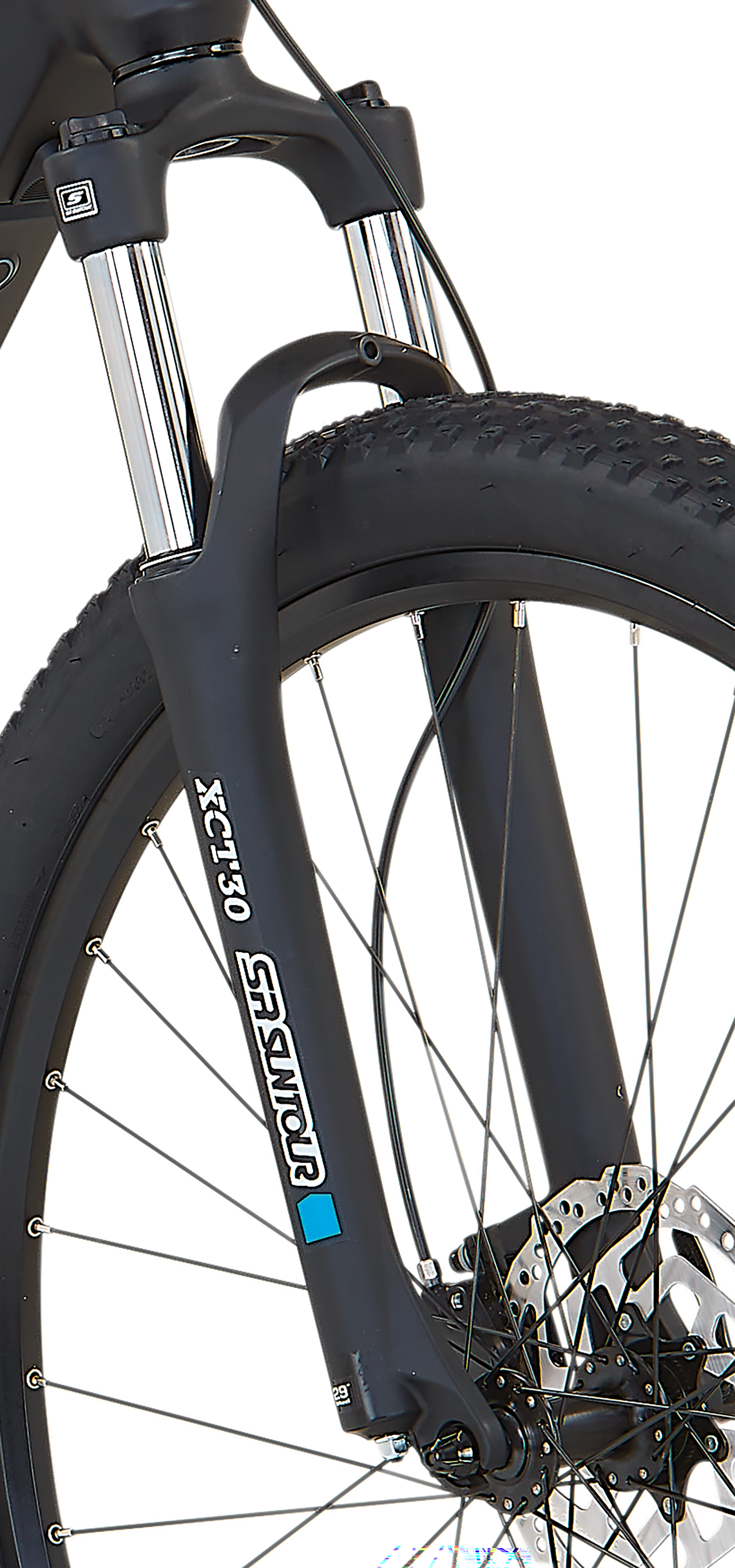 Nahaufnahme des Vorderrads eines blaugrünen Dice E-Bikes vor einem weißen Hintergrund.