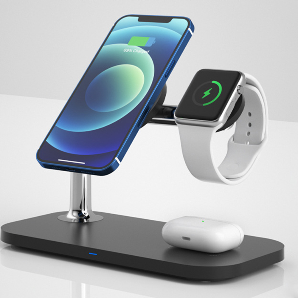 Eine Ladestation lädt ein Telefon, eine Uhr und Ohrhörer auf. Das Telefon zeigt eine Ladung von 69 % an.