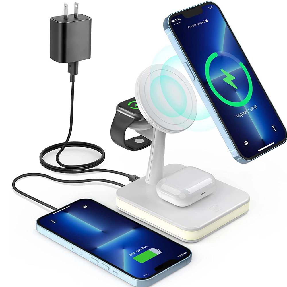 Eine Ladestation mit zwei Telefonen, Ohrhörern und einer Uhr, Ladegerät nicht enthalten.