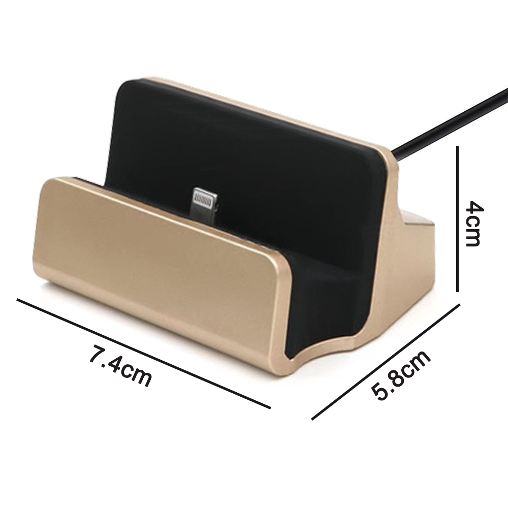 Das Bild zeigt eine goldfarbene Telefon-Dockingstation mit den Maßen 7,4 cm, 5,8 cm und 4 cm.