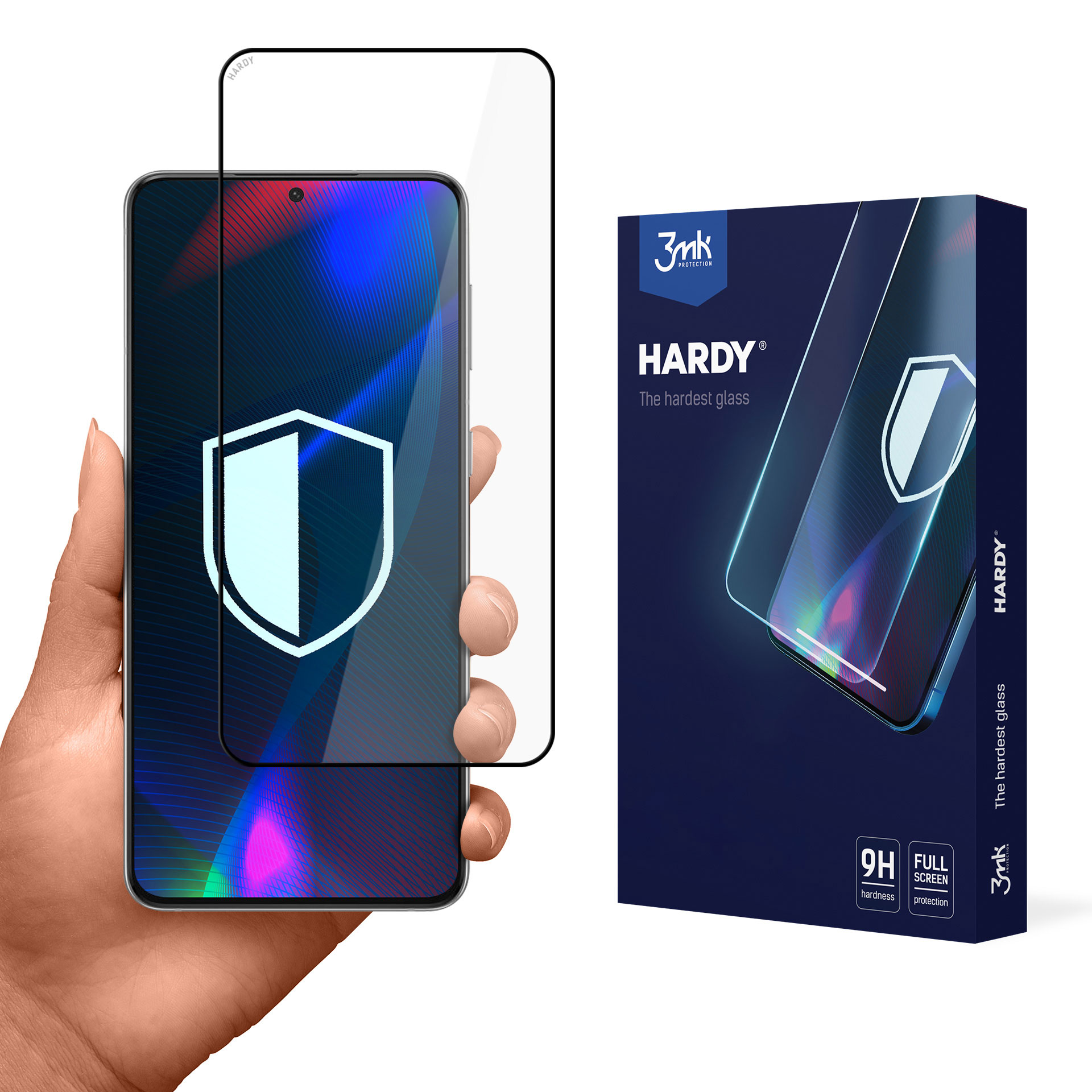 Una mano che tiene un telefono con una protezione per lo schermo. Il telefono è accanto a una scatola con l'etichetta 'HARDY'.