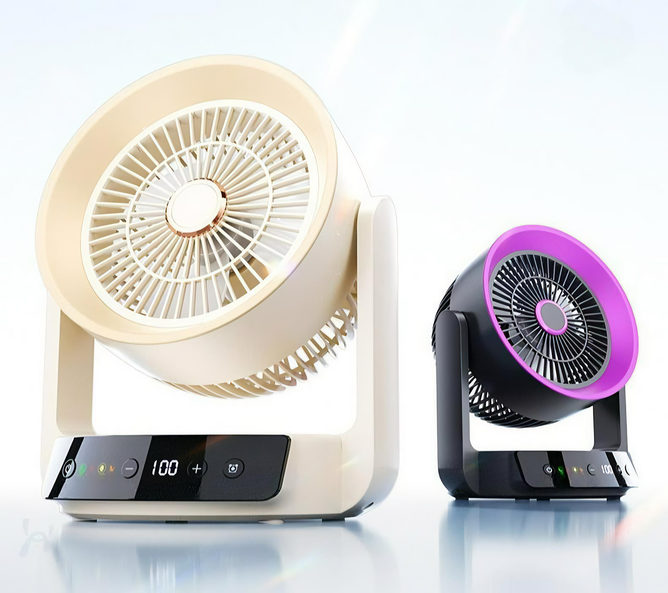 Zwei kleine rotierende Ventilatoren auf einem weißen Hintergrund. Einer ist beige, der andere ist schwarz und lila.