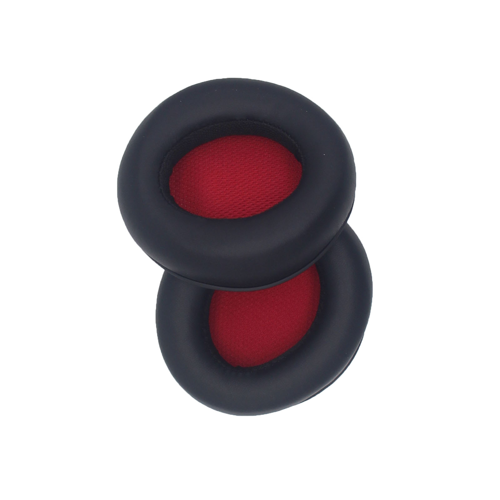 Dwie czarne poduszki na uszy z czerwonymi środkami z tkaniny, ułożone na białym tle.
