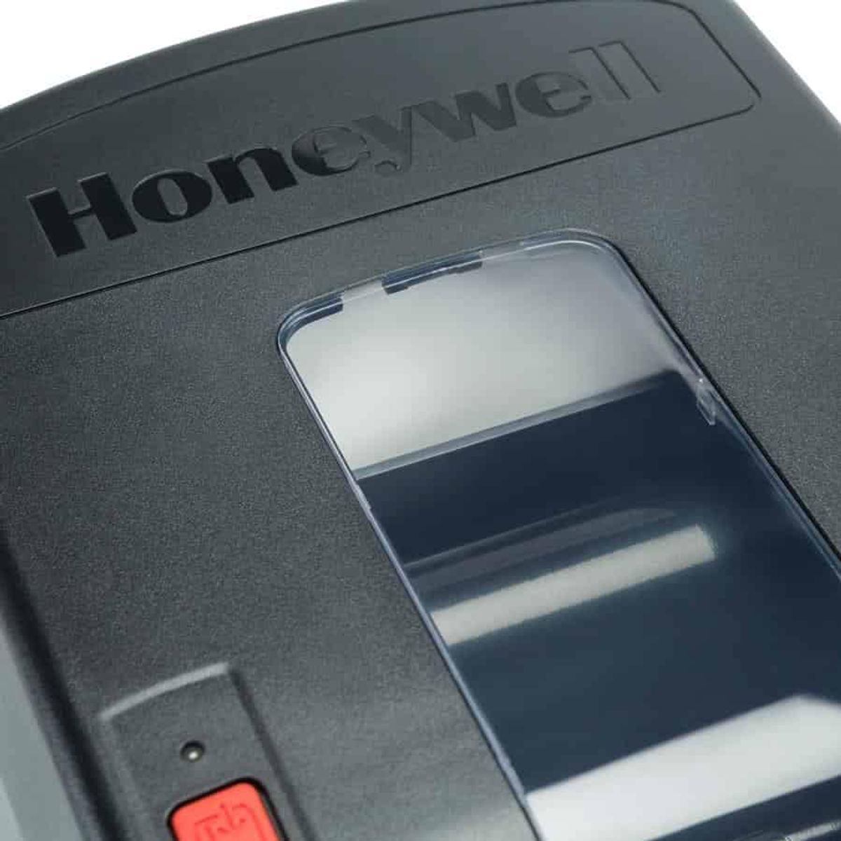 Üstünde Honeywell logosu bulunan bir Honeywell etiket yazıcısının yakın çekimi.