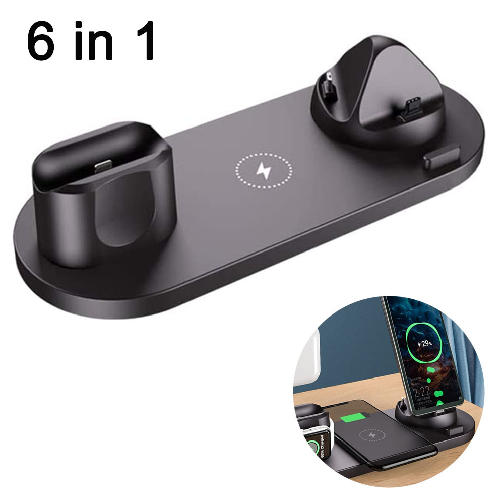 Schwarze 6-in-1-Ladestation mit Docks für Telefone, Uhren und Ohrhörer auf einer Holzoberfläche.