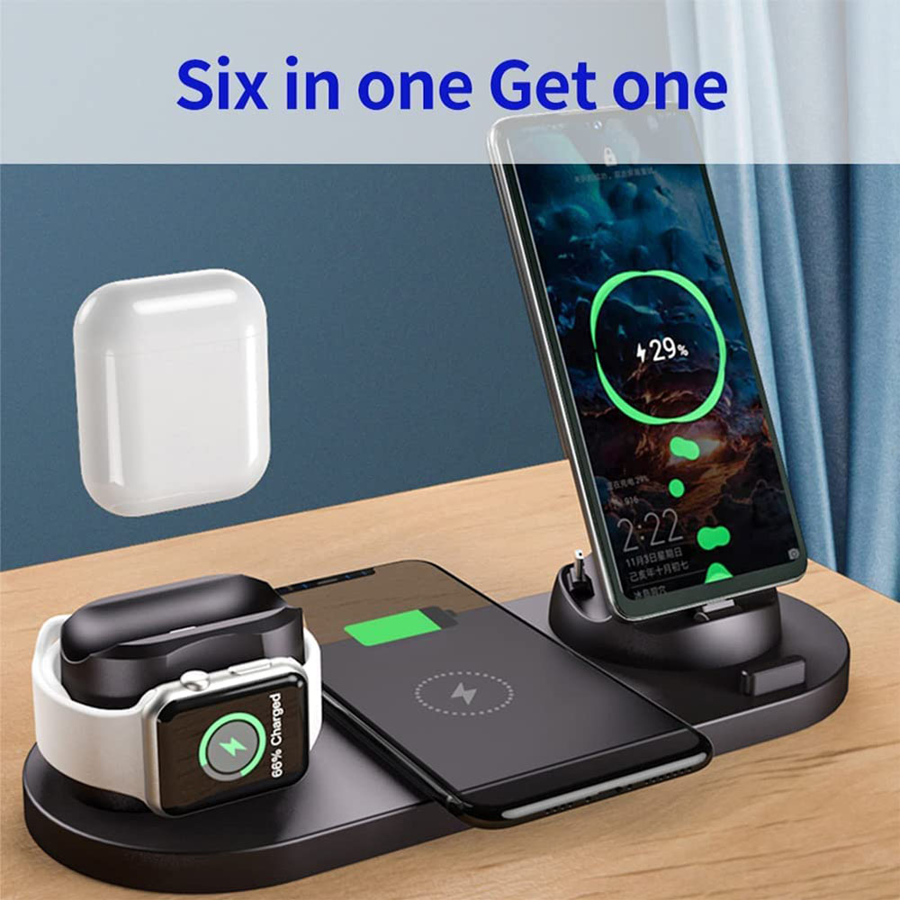Schwarze Multi-Device-Ladestation mit Telefonen, Ohrhörern und einer Uhr, die alle gleichzeitig geladen werden.