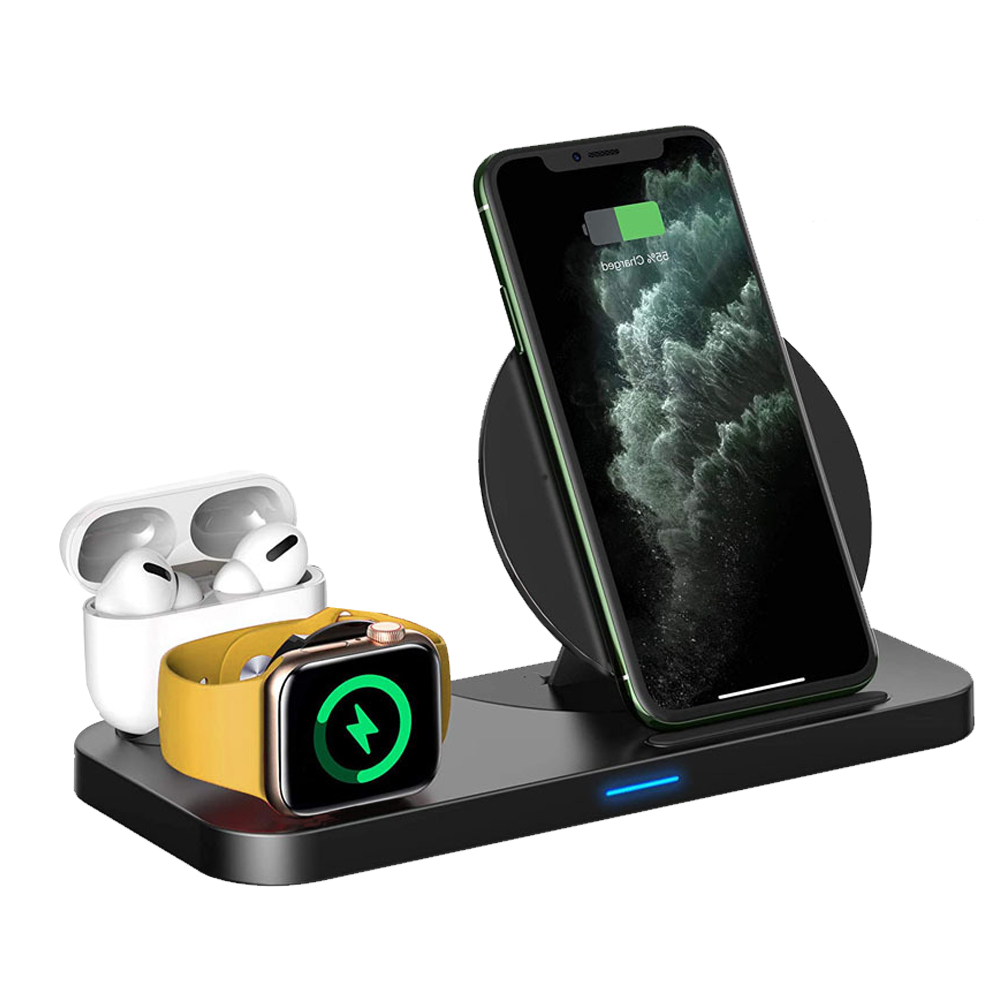 Schwarze Ladestation mit Telefon, Uhr und Ohrhörern. Die Uhr hat ein gelbes Armband.