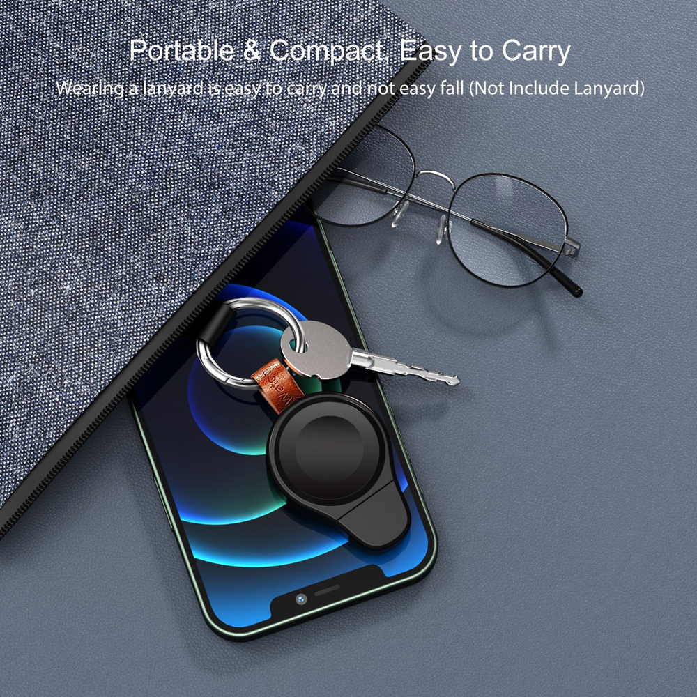 Tragbares Apple Watch-Ladegerät mit Schlüsseln, Brille und einem Telefon in einer Tasche.