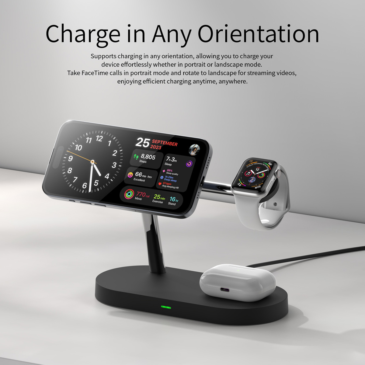 Schwarze Ladestation mit einem Telefon, einer Uhr und Ohrhörern auf einem weißen Tisch. Ein Kabel ist mit der Basis verbunden.